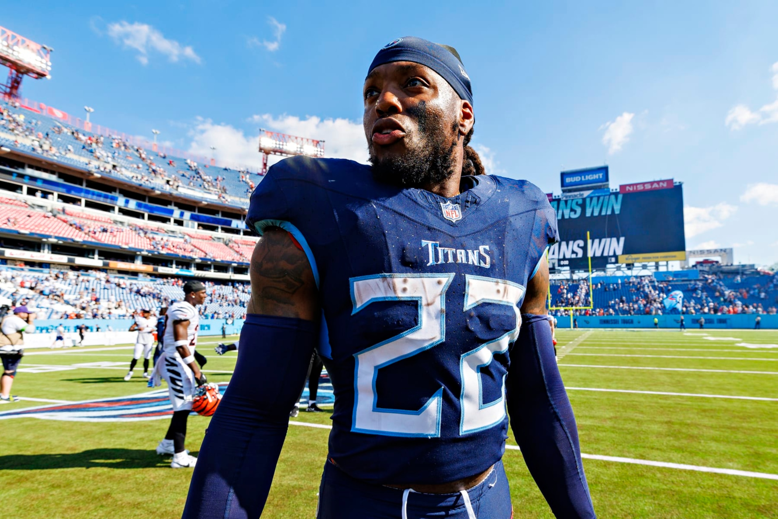 NASHVILLE, TENNESSEE - OCTOBER 1:  Derrick Henry #22 of the Tennessee Titans on the field after the game against the Cincinnati Bengals at Nissan Stadium on October 1, 2023 in Nashville, Tennessee.  The Titans defeated the Bengals 27-3.  (Photo by Wesley Hitt/Getty Images)