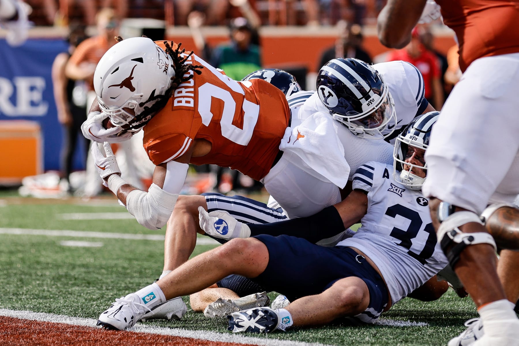 AUSTIN, TEXAS - OCTOBER 28: Jonathon Brooks #24 of the Texas Longhorns dives across the goal line for a touchdown in the first half against the Brigham Young Cougars at Darrell K Royal-Texas Memorial Stadium on October 28, 2023 in Austin, Texas. (Photo by Tim Warner/Getty Images)