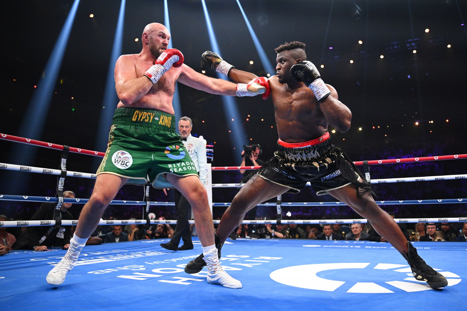 RIYADH, SAUDI ARABIA - OCTOBER 28: Tyson Fury and Francis Ngannou exchange punches during the Heavyweight fight between Tyson Fury and Francis Ngannou at Boulevard Hall on October 28, 2023 in Riyadh, Saudi Arabia. (Photo by Justin Setterfield/Getty Images)