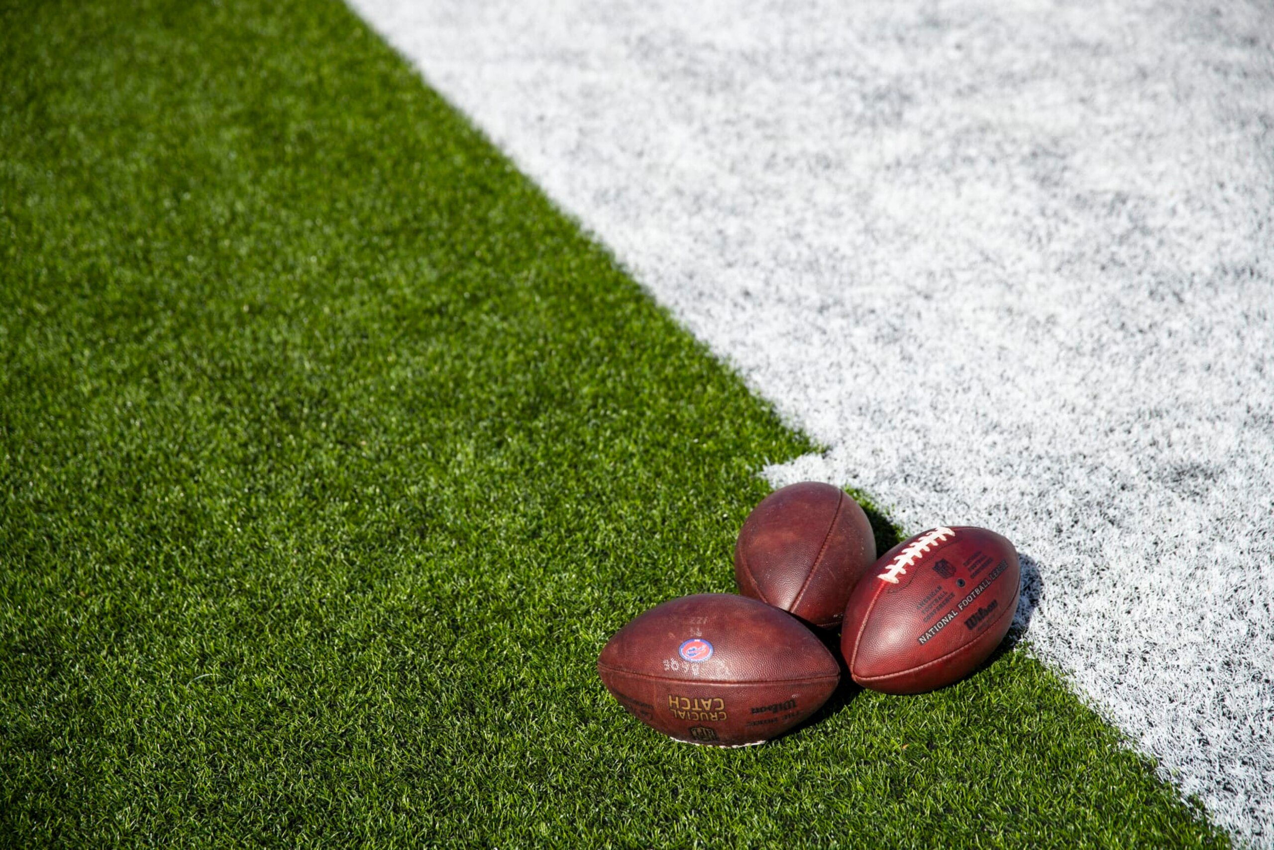 ORCHARD PARK, NY - OCTOBER 20:  Detail view of NFL footballs on the sideline before the game between the Buffalo Bills and the Miami Dolphins at New Era Field on October 20, 2019 in Orchard Park, New York. Buffalo defeats Miami 31-21.  (Photo by Brett Carlsen/Getty Images)