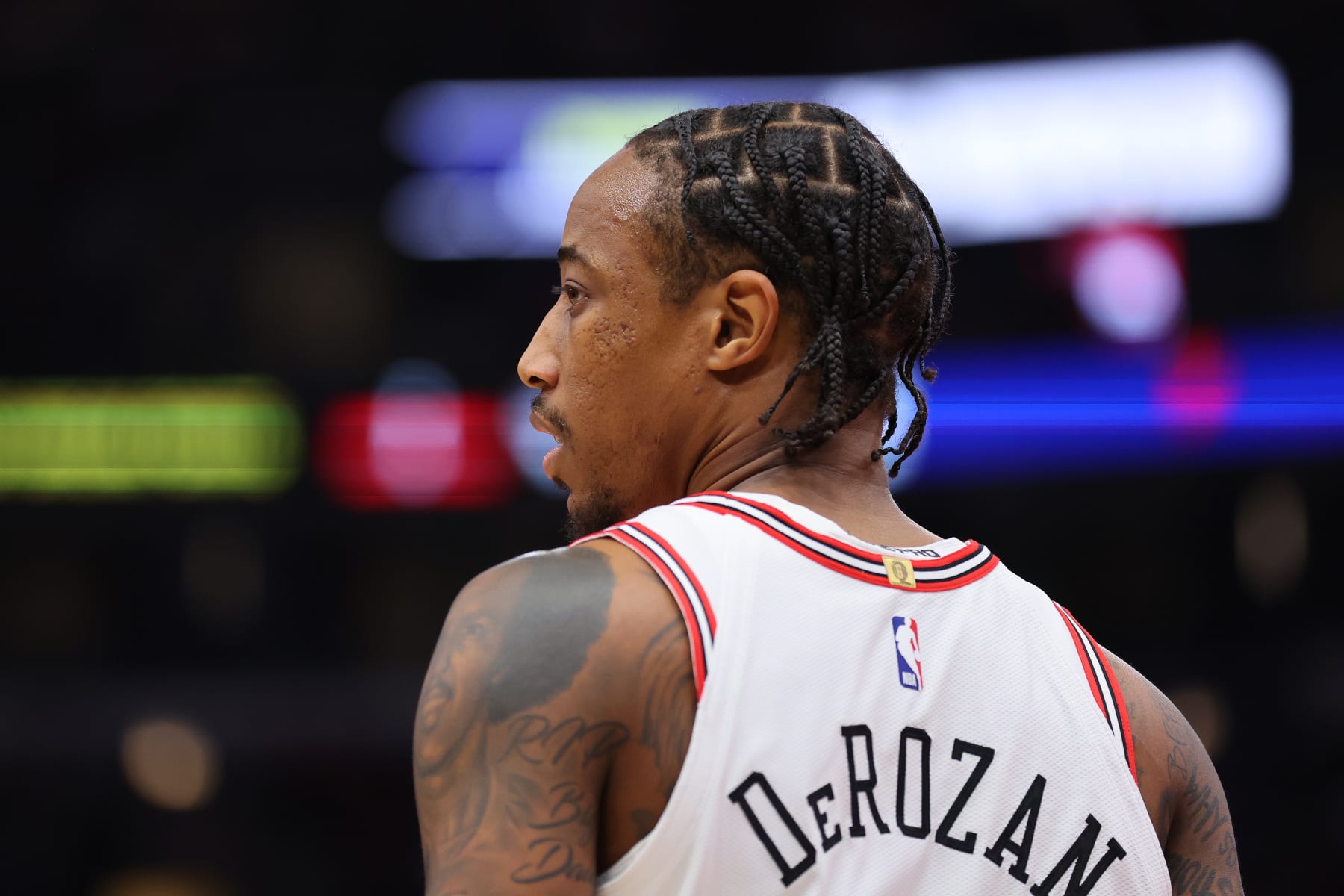 CHICAGO, ILLINOIS - OCTOBER 27: DeMar DeRozan #11 of the Chicago Bulls looks on against the Toronto Raptors during the first half at the United Center on October 27, 2023 in Chicago, Illinois. NOTE TO USER: User expressly acknowledges and agrees that, by downloading and or using this photograph, User is consenting to the terms and conditions of the Getty Images License Agreement. (Photo by Michael Reaves/Getty Images)