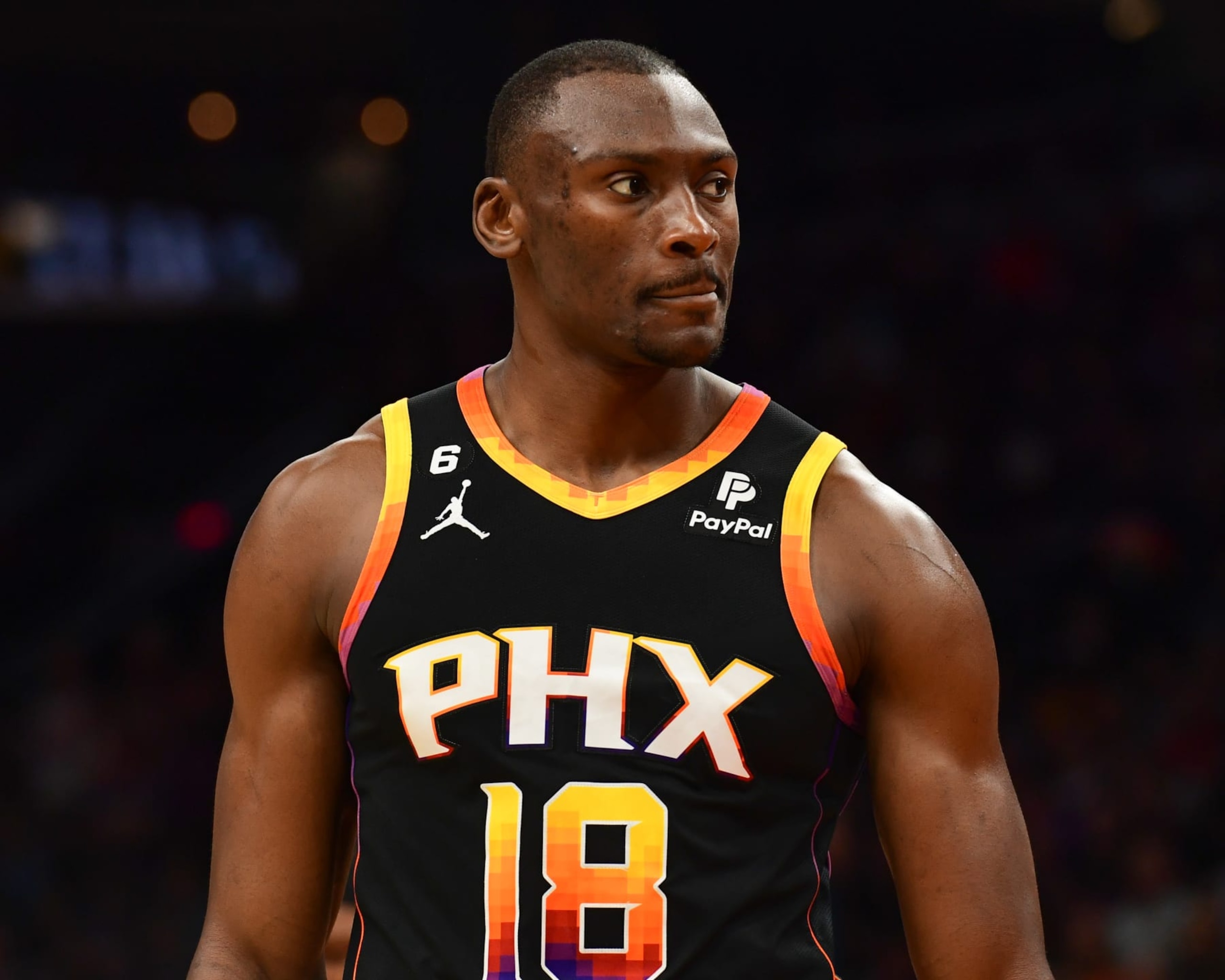 PHOENIX, AZ - APRIL 18:  Bismack Biyombo #18 of the Phoenix Suns looks on during the game during round one game two of the 2023 NBA Playoffs on April 18, 2023 at Footprint Center in Phoenix, Arizona. NOTE TO USER: User expressly acknowledges and agrees that, by downloading and or using this photograph, user is consenting to the terms and conditions of the Getty Images License Agreement. Mandatory Copyright Notice: Copyright 2023 NBAE (Photo by Kate Frese/NBAE via Getty Images)