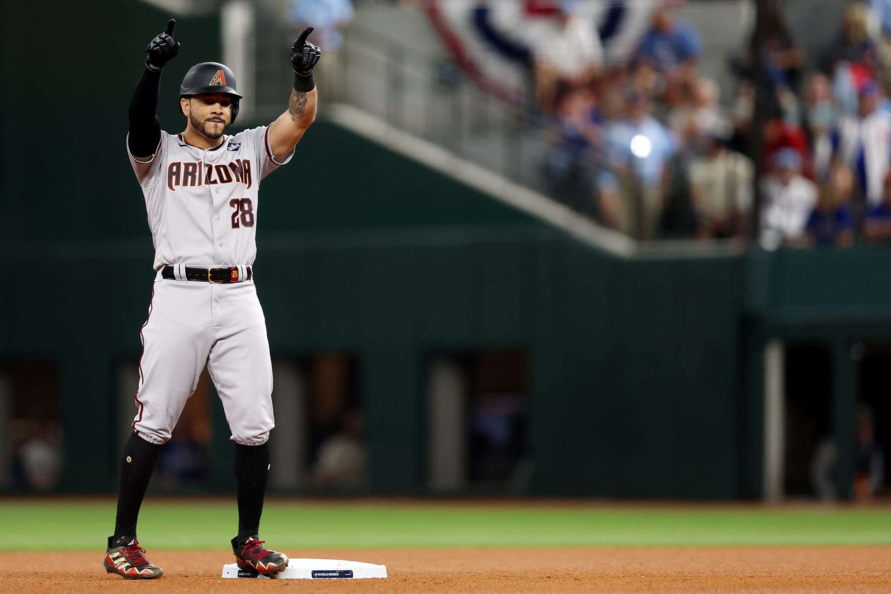 ARLINGTON, TX - OCTOBER 28:  Tommy Pham #28 of the Arizona Diamondbacks celebrates after hitting a double win the fourth inning during Game 2 of the 2023 World Series between the Arizona Diamondbacks and the Texas Rangers at Globe Life Field on Saturday, October 28, 2023 in Arlington, Texas. (Photo by Rob Tringali/MLB Photos via Getty Images)