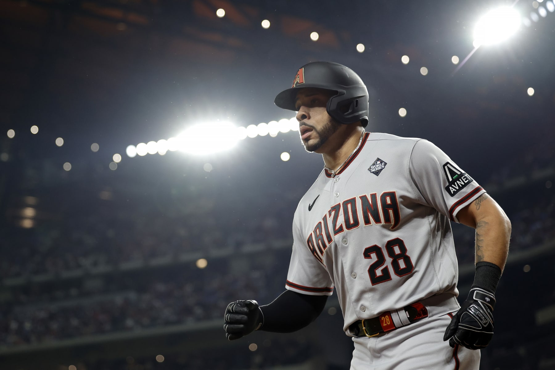ARLINGTON, TEXAS - OCTOBER 28: Tommy Pham #28 of the Arizona Diamondbacks celebrates after scoring a run in the fourth inning against the Texas Rangers during Game Two of the World Series at Globe Life Field on October 28, 2023 in Arlington, Texas. (Photo by Carmen Mandato/Getty Images)