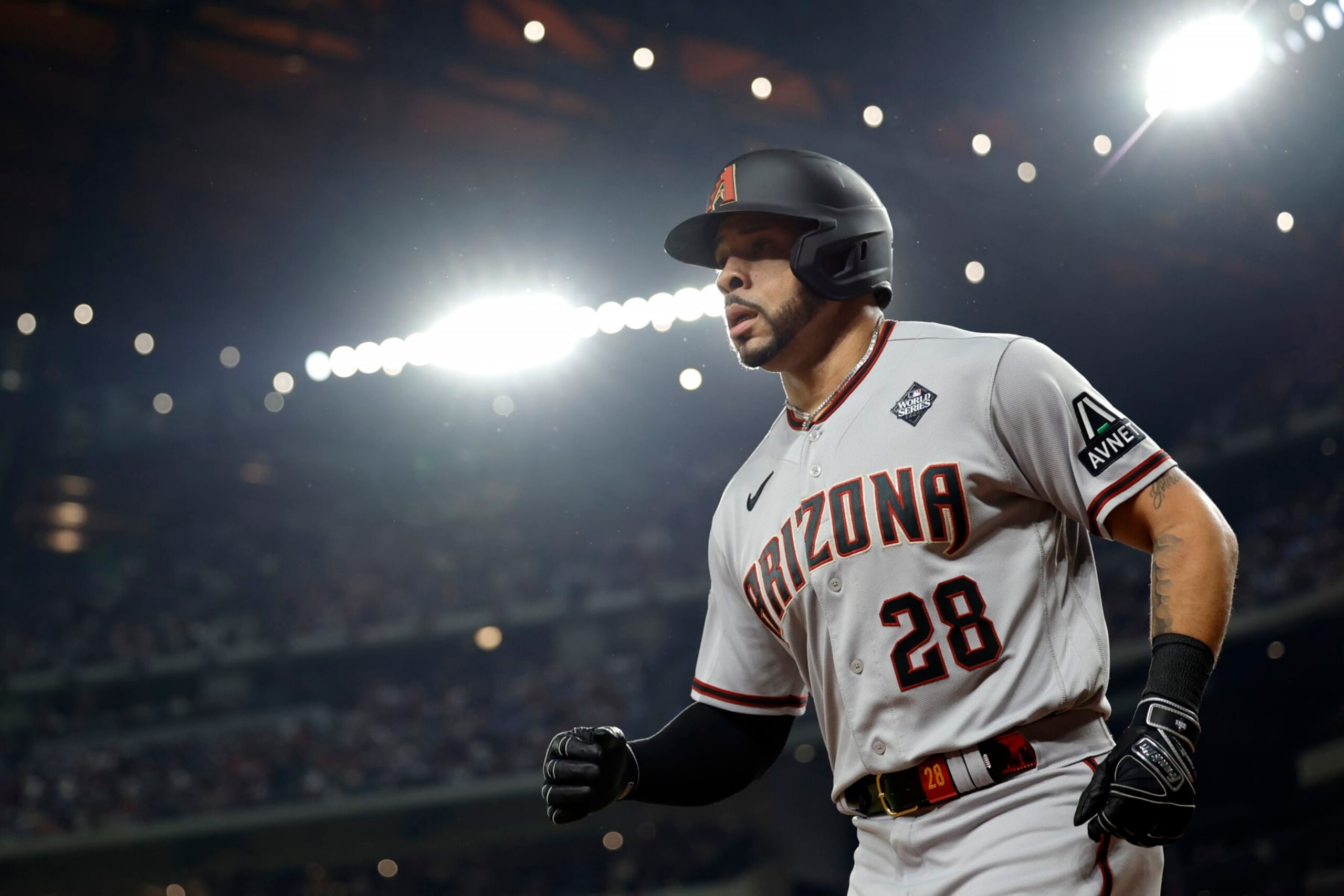 ARLINGTON, TEXAS - OCTOBER 28: Tommy Pham #28 of the Arizona Diamondbacks celebrates after scoring a run in the fourth inning against the Texas Rangers during Game Two of the World Series at Globe Life Field on October 28, 2023 in Arlington, Texas. (Photo by Carmen Mandato/Getty Images)