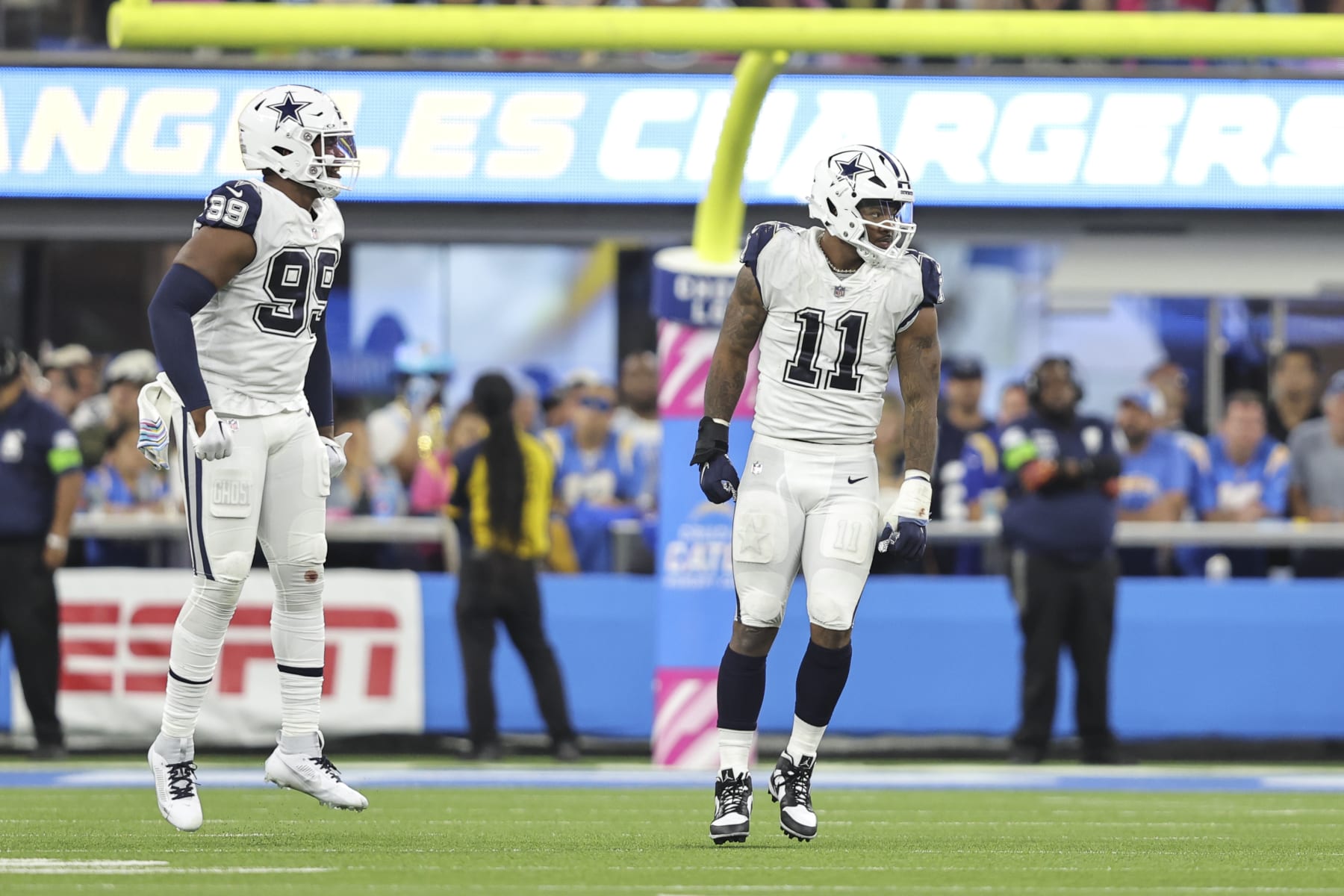 INGLEWOOD, CALIFORNIA - OCTOBER 16: Micah Parsons #11 of the Dallas Cowboys reacts after a sack during an NFL football game between the Los Angeles Chargers and the Dallas Cowboys at SoFi Stadium on October 16, 2023 in Inglewood, California. (Photo by Michael Owens/Getty Images)