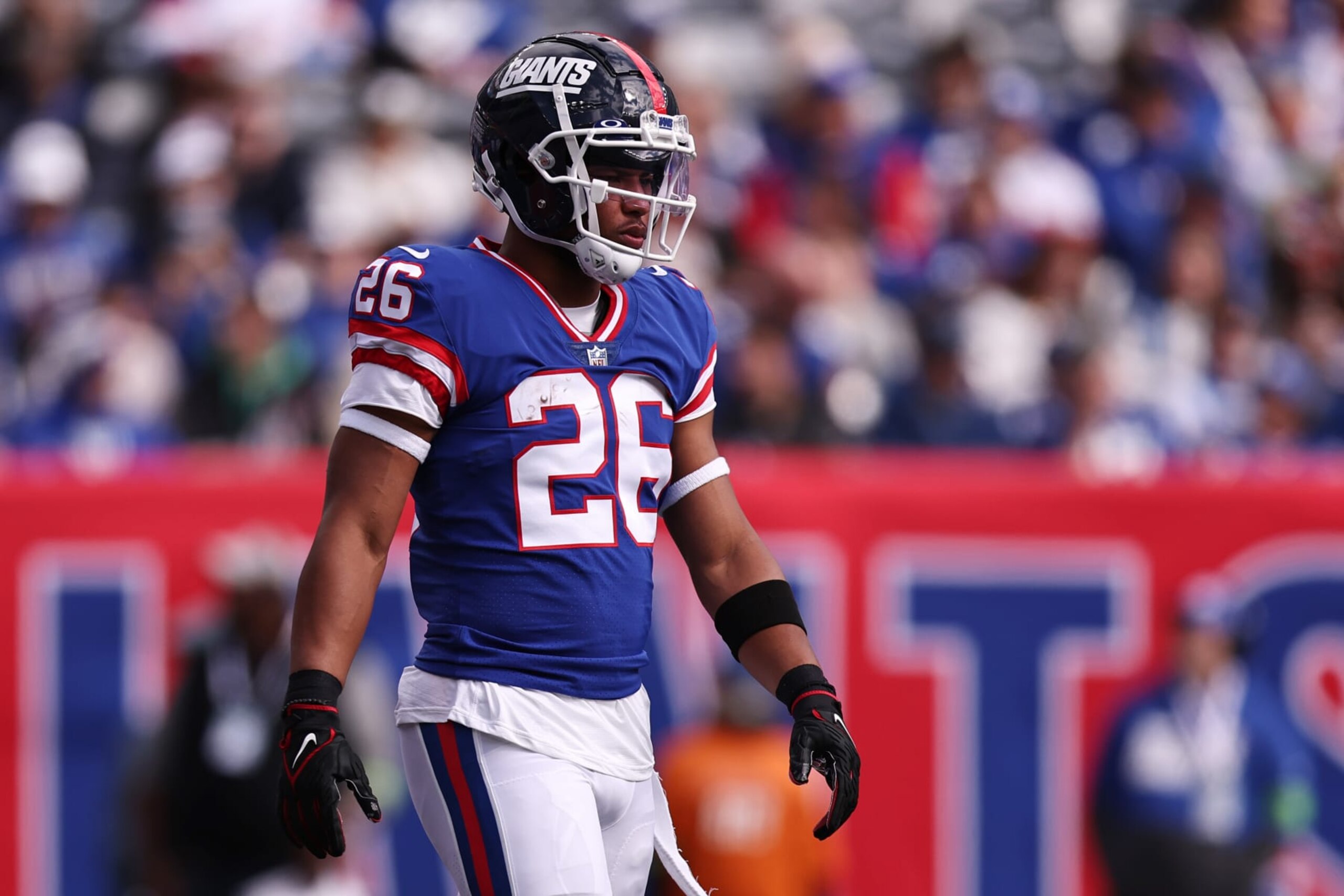 EAST RUTHERFORD, NEW JERSEY - OCTOBER 22: Saquon Barkley #26 of the New York Giants looks on during the first half of the game against the Washington Commanders at MetLife Stadium on October 22, 2023 in East Rutherford, New Jersey. (Photo by Dustin Satloff/Getty Images) EAST RUTHERFORD, NEW JERSEY - OCTOBER 22: Saquon Barkley #26 of the New York Giants looks on during the first half of the game against the Washington Commanders at MetLife Stadium on October 22, 2023 in East Rutherford, New Jersey. (Photo by Dustin Satloff/Getty Images)