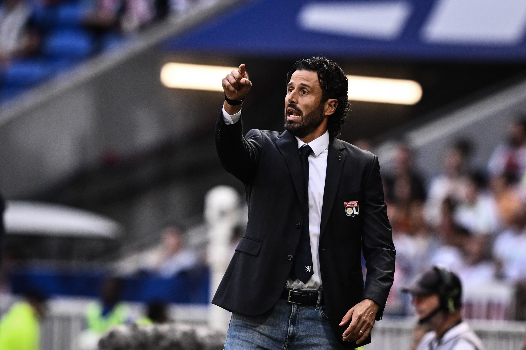 Lyon's Italian new head coach Fabio Grosso gestures during the French L1 football match between Olympique Lyonnais (OL) and FC Lorient (FCL) at The Groupama Stadium in Decines-Charpieu, central-eastern France on October 8, 2023. (Photo by JEFF PACHOUD / AFP) (Photo by JEFF PACHOUD/AFP via Getty Images)