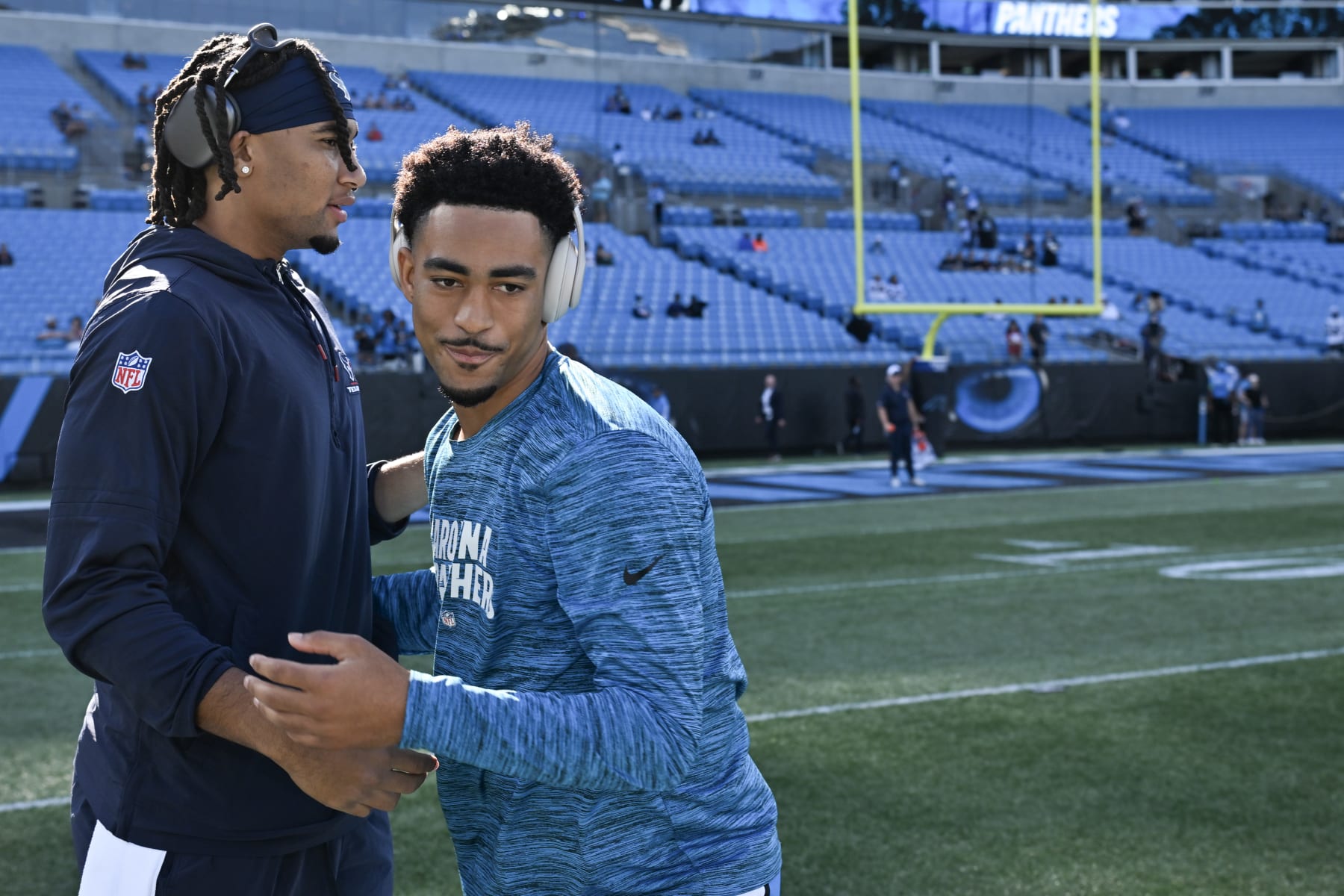 CHARLOTTE, NORTH CAROLINA - OCTOBER 29: (L-R) C.J. Stroud #7 of the Houston Texans shakes hands with Bryce Young #9 of the Carolina Panthers prior to a game at Bank of America Stadium on October 29, 2023 in Charlotte, North Carolina. (Photo by Grant Halverson/Getty Images)