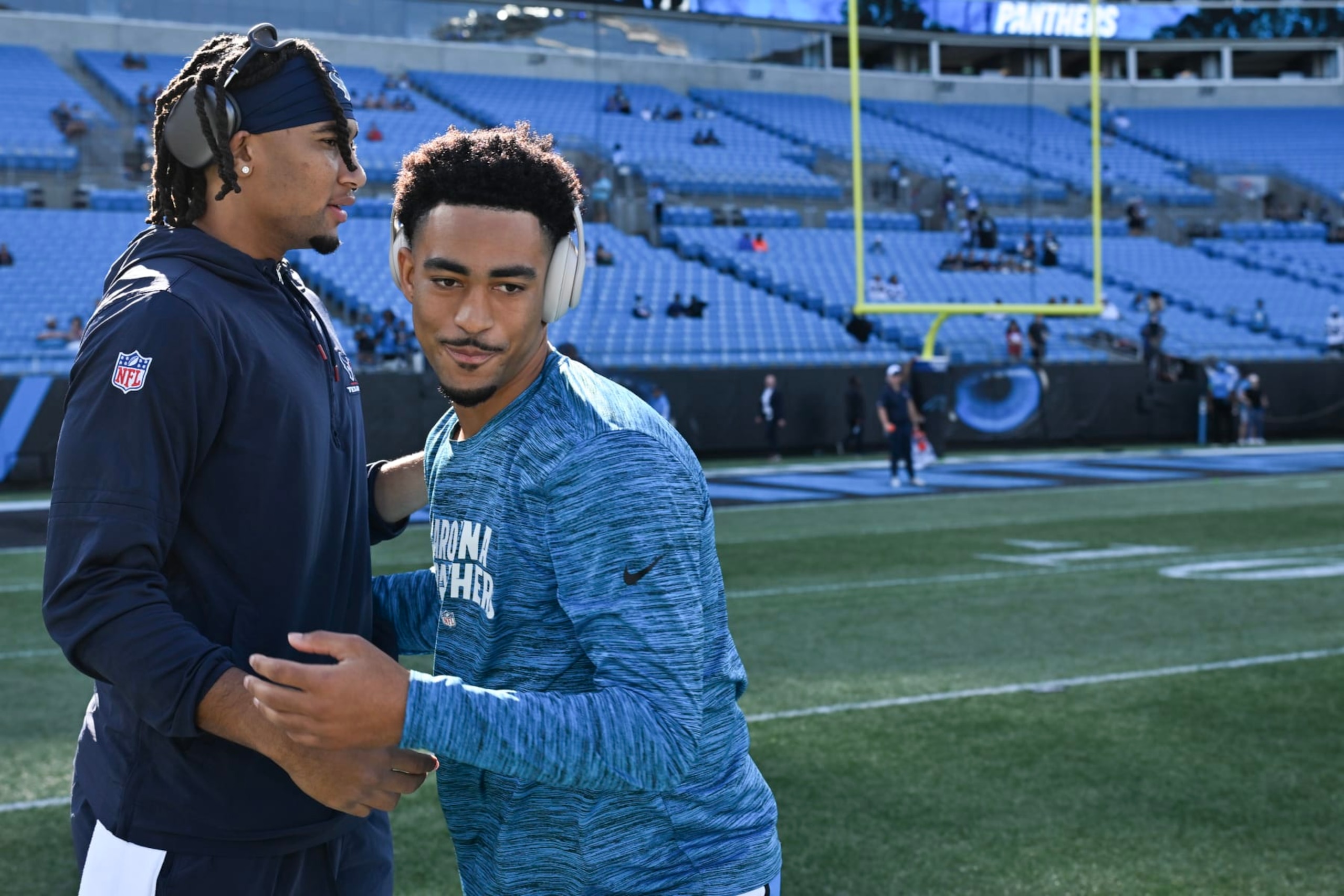CHARLOTTE, NORTH CAROLINA - OCTOBER 29: (L-R) C.J. Stroud #7 of the Houston Texans shakes hands with Bryce Young #9 of the Carolina Panthers prior to a game at Bank of America Stadium on October 29, 2023 in Charlotte, North Carolina. (Photo by Grant Halverson/Getty Images)
