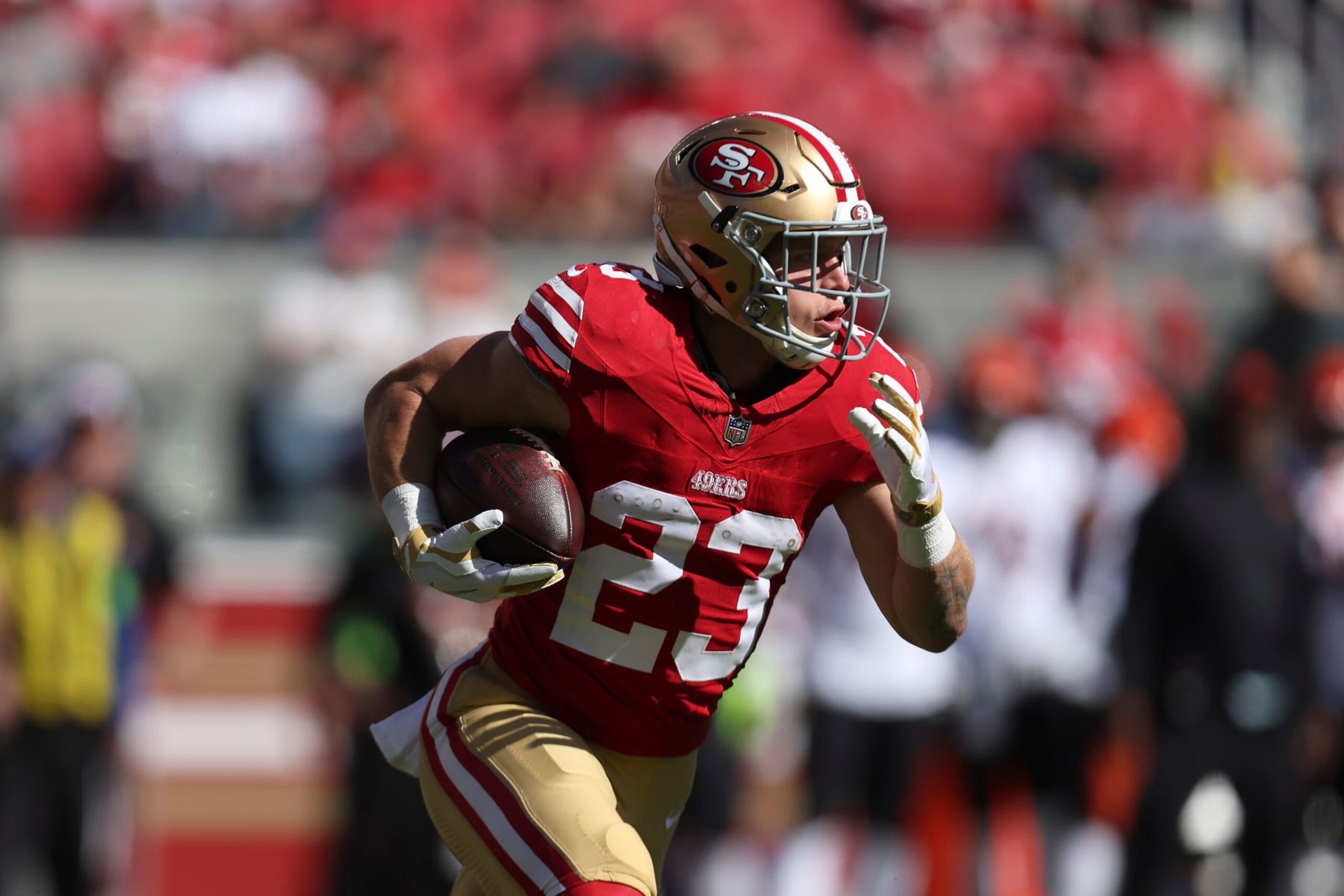 San Francisco 49ers running back Christian McCaffrey (23) runs against the Cincinnati Bengals during the first half of an NFL football game in Santa Clara, Calif., Sunday, Oct. 29, 2023. (AP Photo/Jed Jacobsohn)
