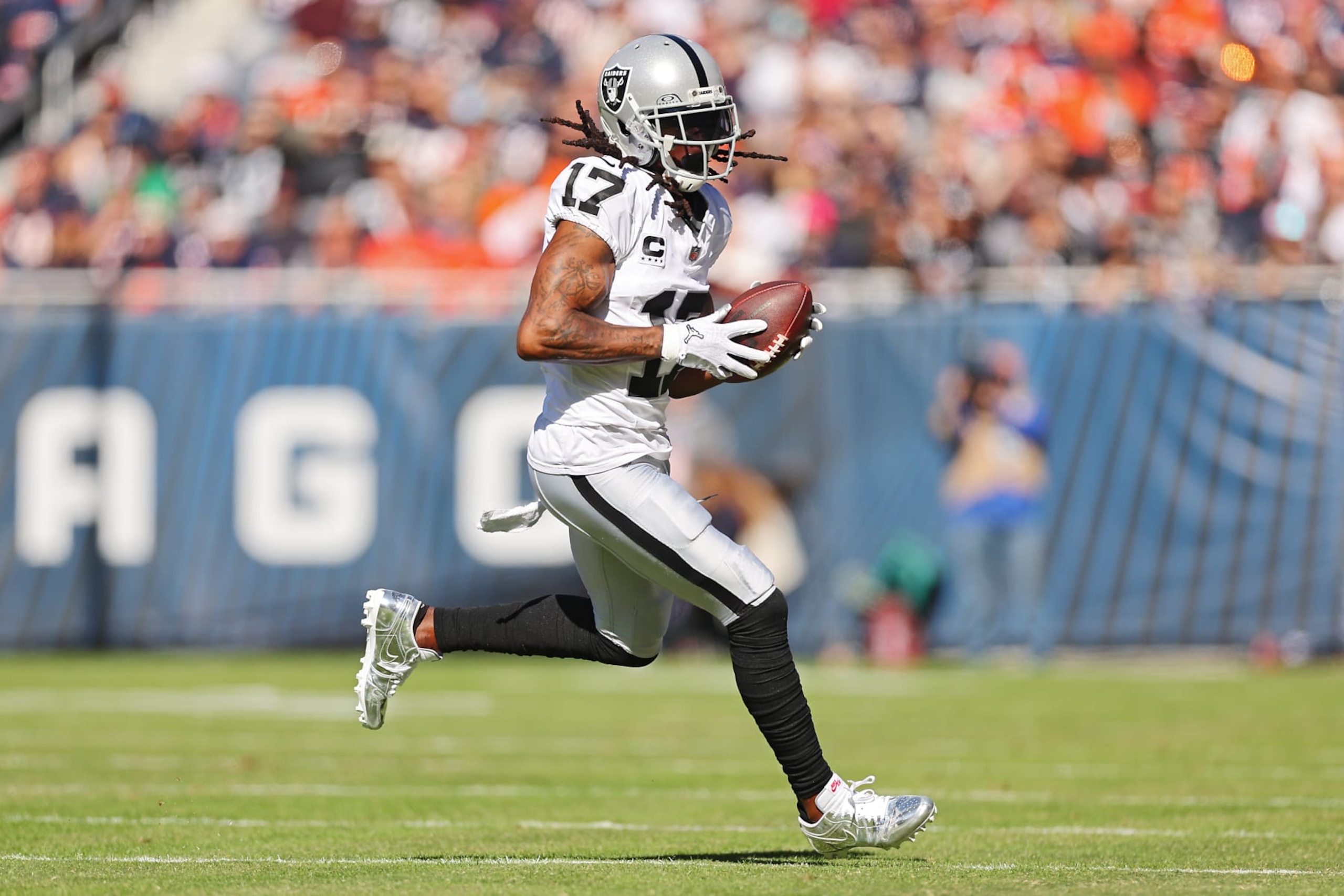 CHICAGO, ILLINOIS - OCTOBER 22: Davante Adams #17 of the Las Vegas Raiders runs with the ball during the first quarter against the Chicago Bears at Soldier Field on October 22, 2023 in Chicago, Illinois. (Photo by Michael Reaves/Getty Images)
