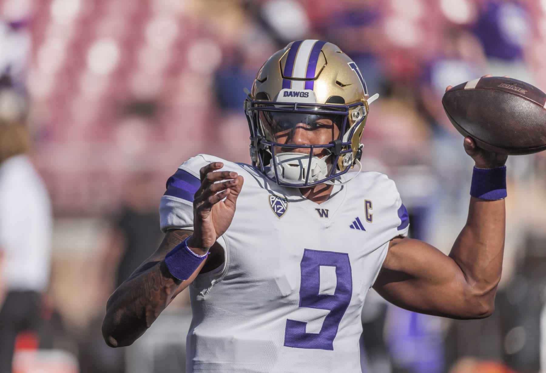PALO ALTO, CA - OCTOBER  28:  Quarterback Michael Penix Jr. #9 of the Washington Huskies warms up before a Pac-12 NCAA college football game against the Stanford Cardinal on October 28, 2023 at Stanford Stadium in Palo Alto, California.  (Photo by David Madison/Getty Images)