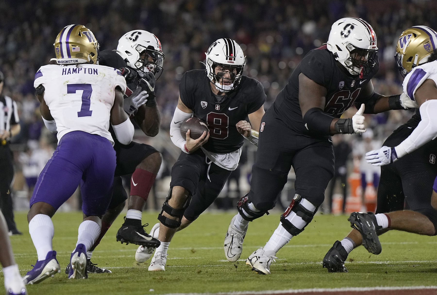 STANFORD, CALIFORNIA - OCTOBER 28: Justin Lamson #8 of the Stanford Cardinal runs for a two yard touchdown against the Washington Huskies in the fourth quarter at Stanford Stadium on October 28, 2023 in Stanford, California. (Photo by Thearon W. Henderson/Getty Images)
