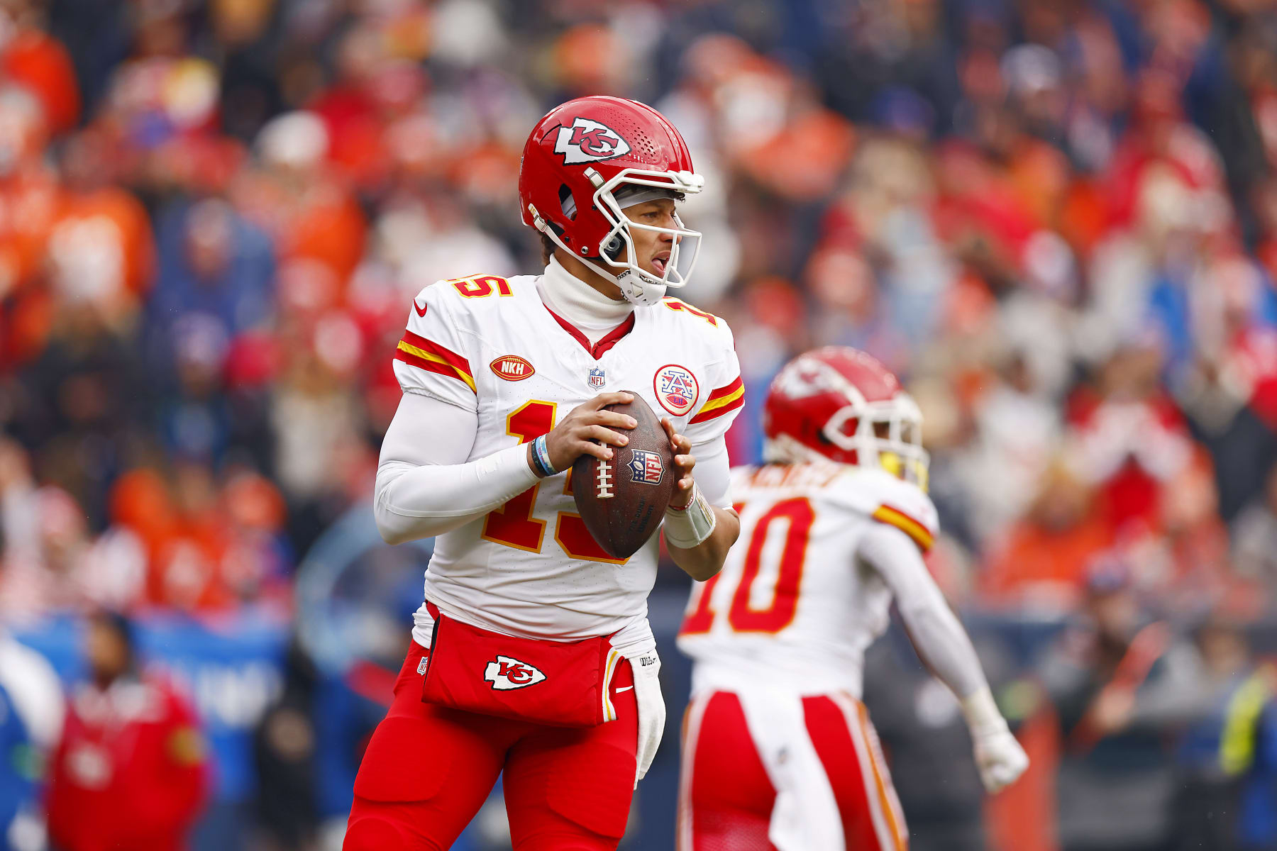 DENVER, COLORADO - OCTOBER 29: Patrick Mahomes #15 of the Kansas City Chiefs looks to throw the ball during the first quarter against the Denver Broncos at Empower Field At Mile High on October 29, 2023 in Denver, Colorado. (Photo by Justin Edmonds/Getty Images)