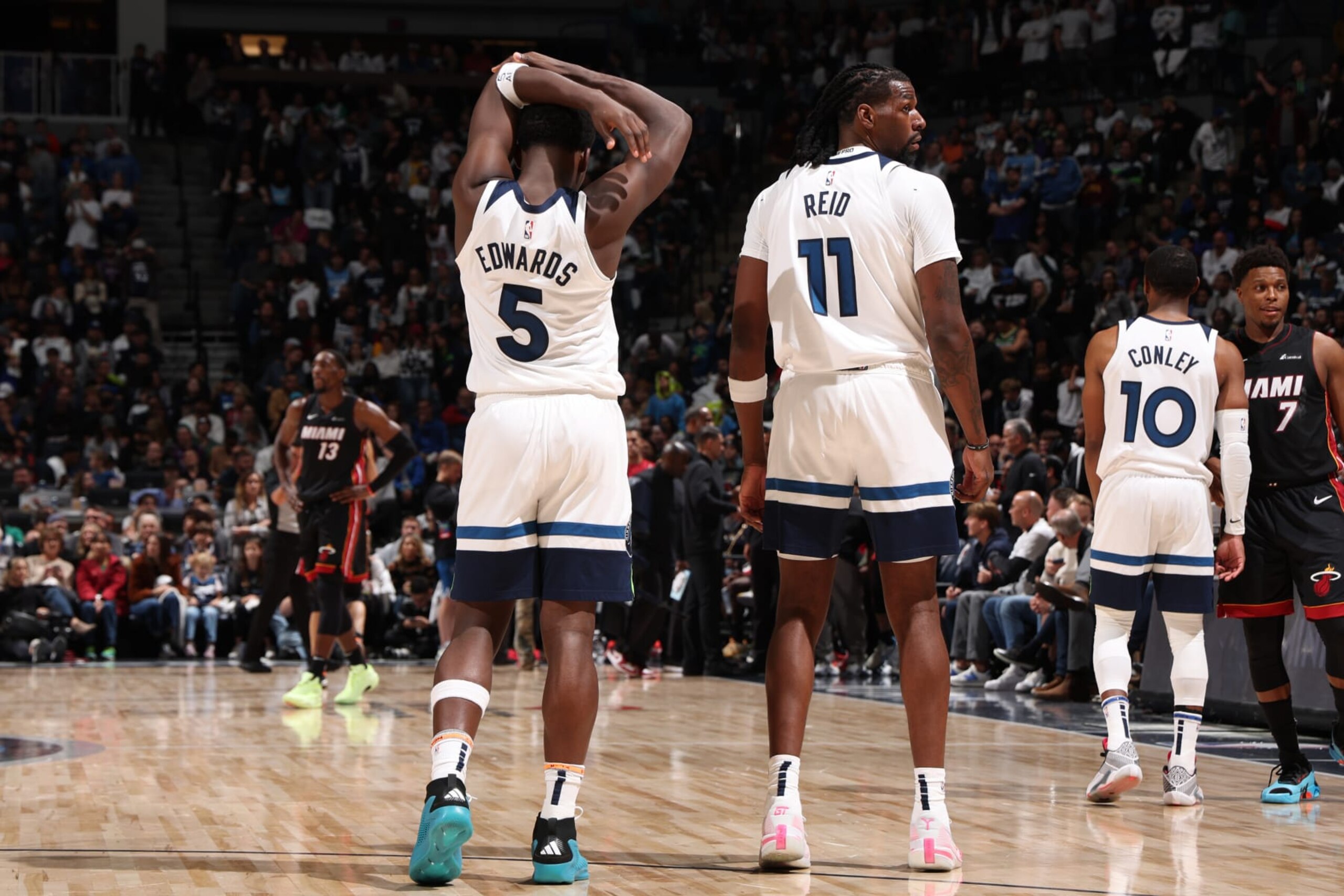 Anthony Edwards, Naz Reid and Mike Conley