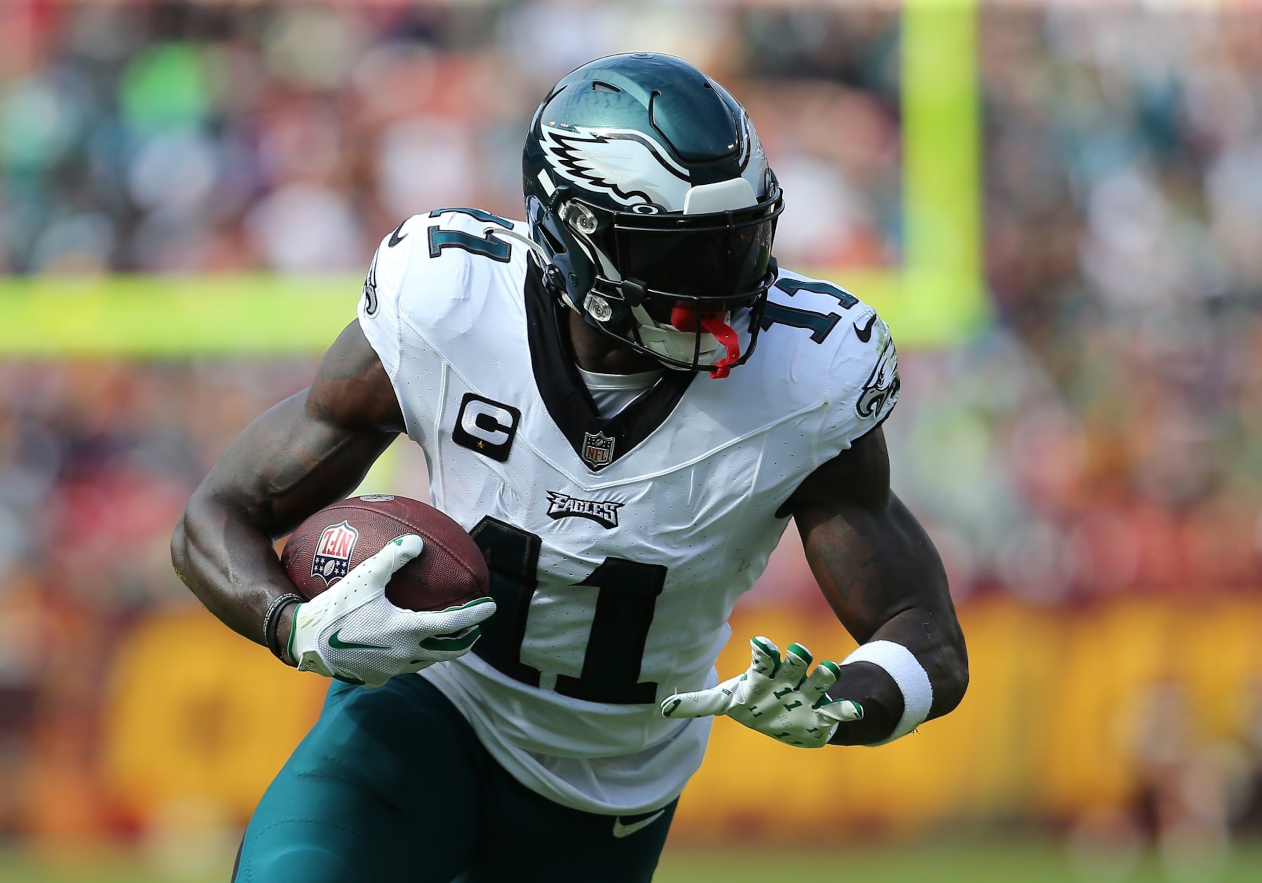 LANDOVER, MD - OCTOBER 29: Philadelphia Eagles wide receiver A.J. Brown (11) hauls in a pass then rushes up field during the Philadelphia Eagles game versus the Washington Commanders on October 29, 2023, at FedEx Field in Landover, MD. (Photo by Lee Coleman/Icon Sportswire via Getty Images)