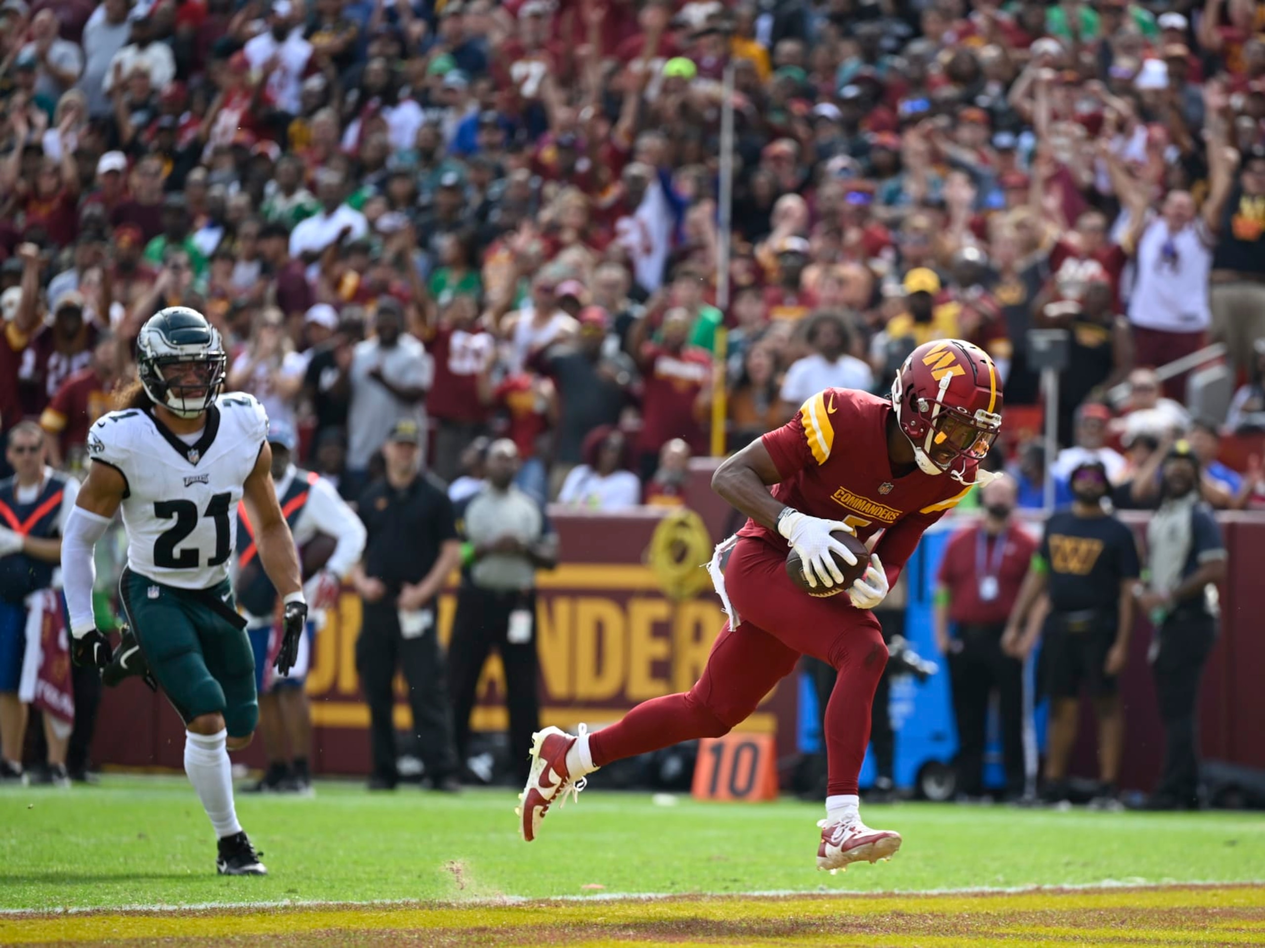 LANDOVER, MD - OCTOBER 29:Washington Commanders wide receiver Jahan Dotson (1) scores a second quarter touchdown during the game against the Philadelphia Eagles at FedEx Field on October 29, 2023. (Photo by John McDonnell/The Washington Post via Getty Images)