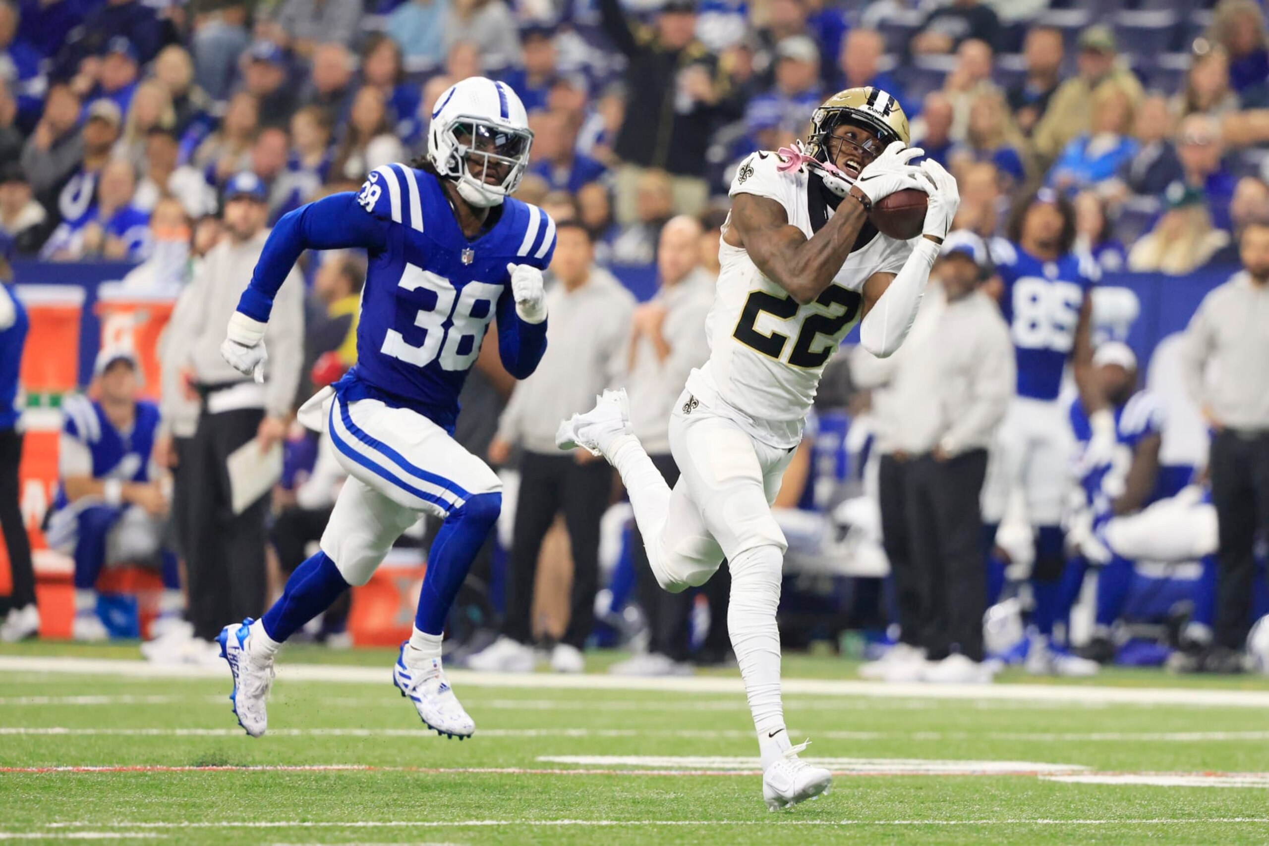 INDIANAPOLIS, INDIANA - OCTOBER 29: Rashid Shaheed #22 of the New Orleans Saints catches a touchdown pass while Tony Brown #38 of the Indianapolis Colts pursues during the second quarter at Lucas Oil Stadium on October 29, 2023 in Indianapolis, Indiana. (Photo by Justin Casterline/Getty Images)