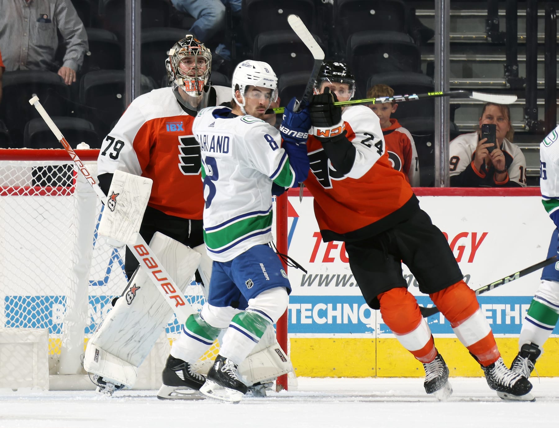 Vancouver Canucks winger Conor Garland (center) in action against the Philadelphia Flyers. 