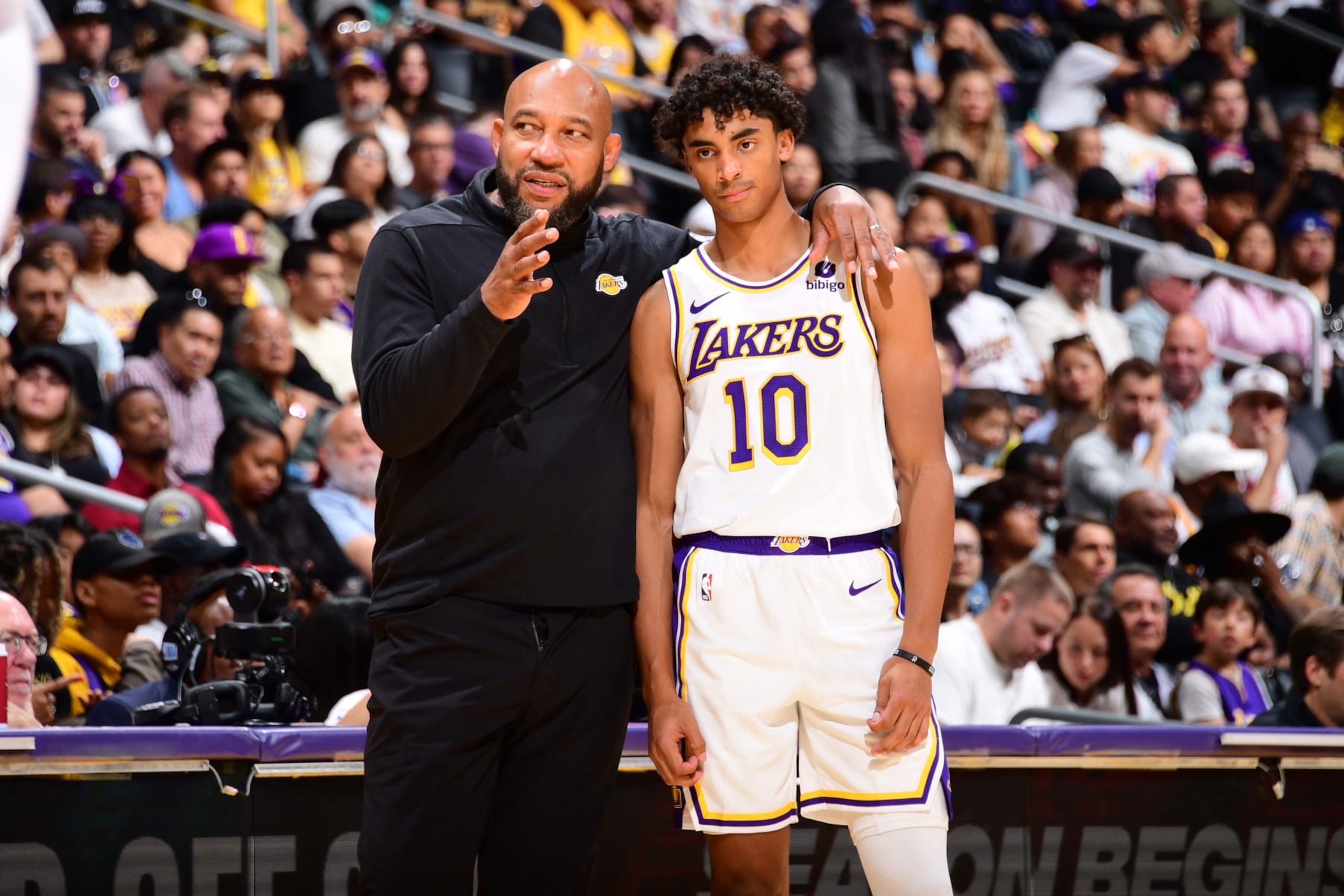 LOS ANGELES, CA - OCTOBER 15: Head Coach Darvin Ham and Max Christie #10 of the Los Angeles Lakers look on during the game against the Milwaukee Bucks on October 15, 2023 at Crypto.Com Arena in Los Angeles, California. NOTE TO USER: User expressly acknowledges and agrees that, by downloading and/or using this Photograph, user is consenting to the terms and conditions of the Getty Images License Agreement. Mandatory Copyright Notice: Copyright 2023 NBAE (Photo by Adam Pantozzi/NBAE via Getty Images)