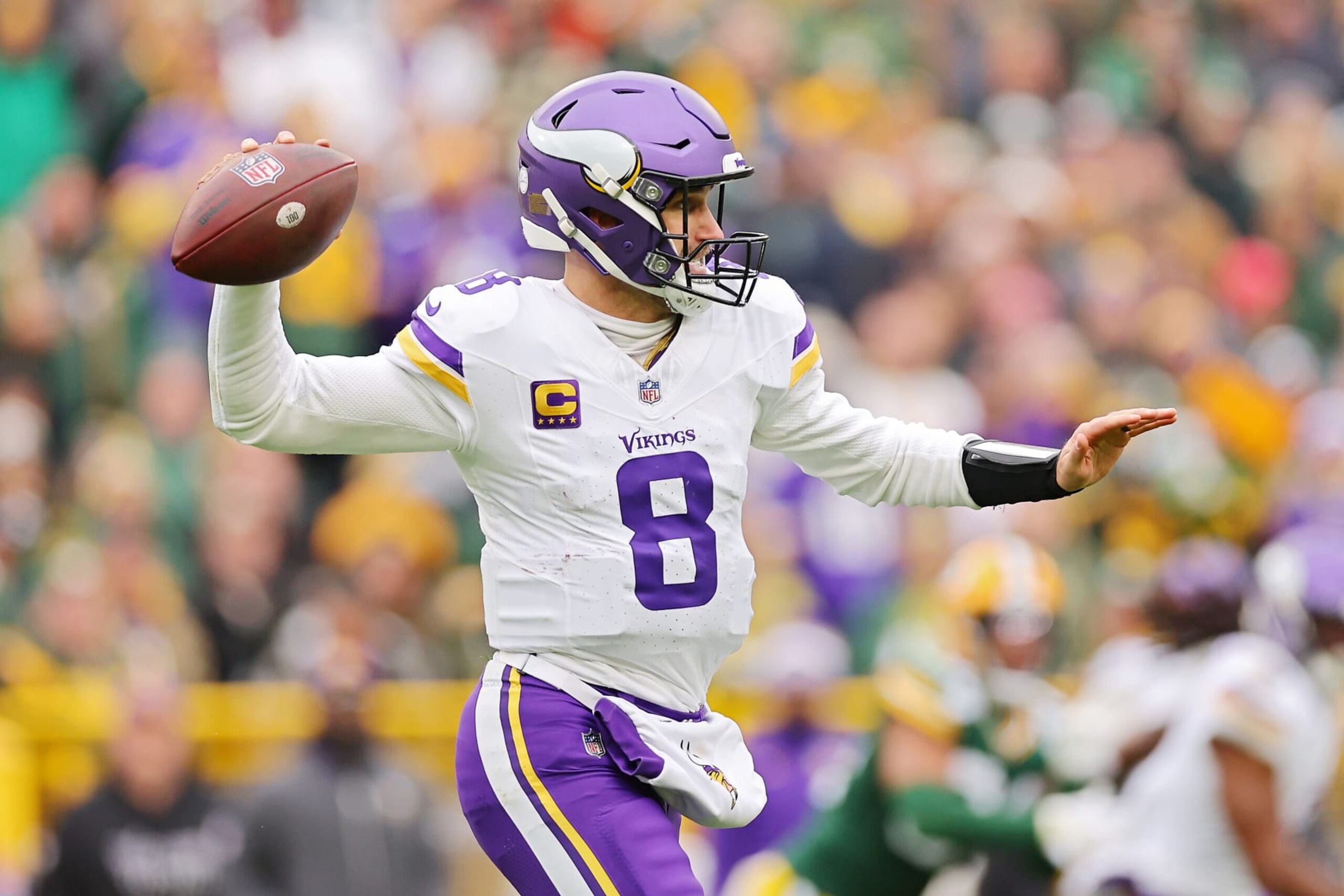 GREEN BAY, WISCONSIN - OCTOBER 29: Kirk Cousins #8 of the Minnesota Vikings throws a pass during the second quarter against the Green Bay Packers at Lambeau Field on October 29, 2023 in Green Bay, Wisconsin. (Photo by Michael Reaves/Getty Images)