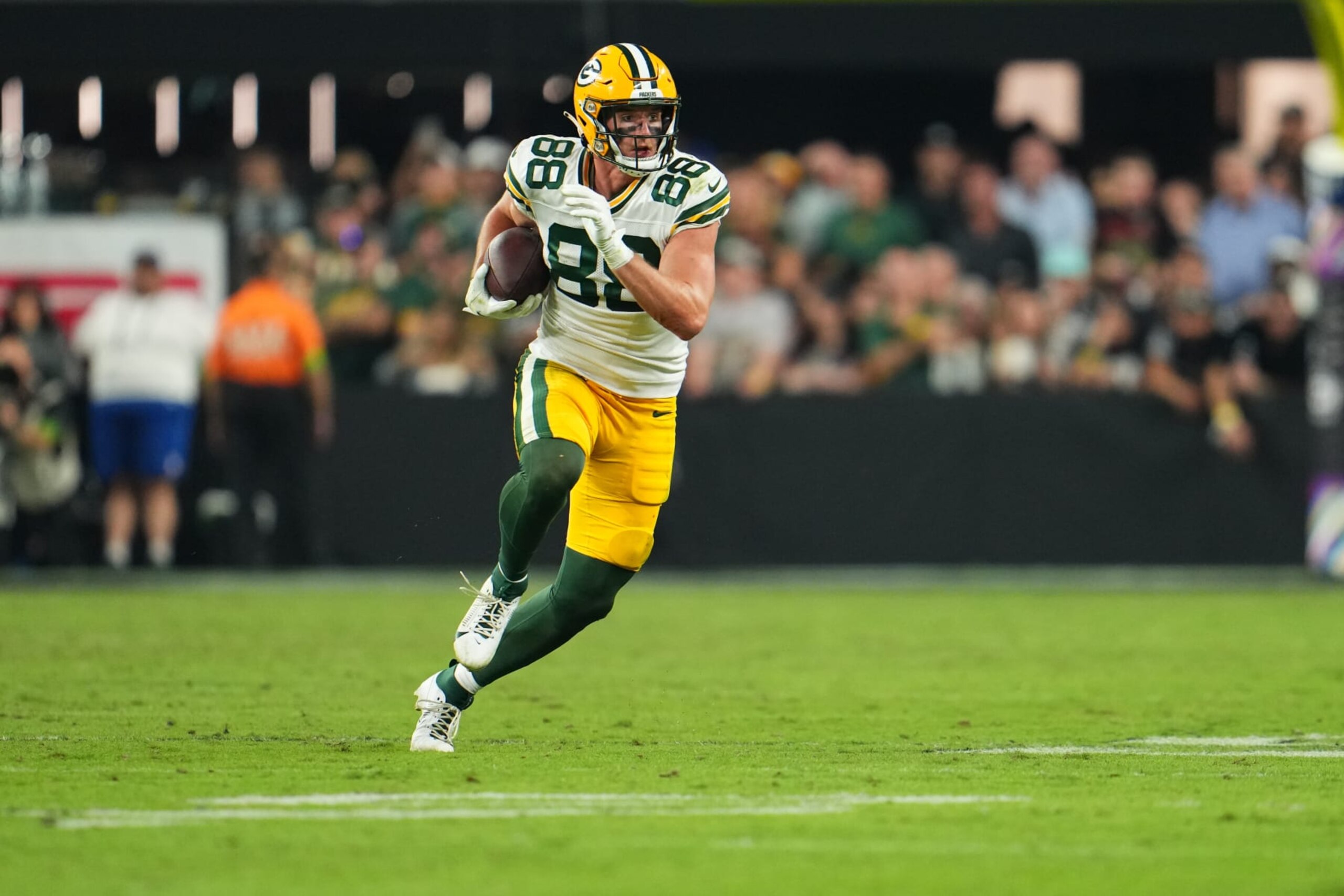 LAS VEGAS, NV - OCTOBER 09: Luke Musgrave #88 of the Green Bay Packers runs with the ball against the Las Vegas Raiders during the second half at Allegiant Stadium on October 9, 2023 in Las Vegas, Nevada. (Photo by Cooper Neill/Getty Images)