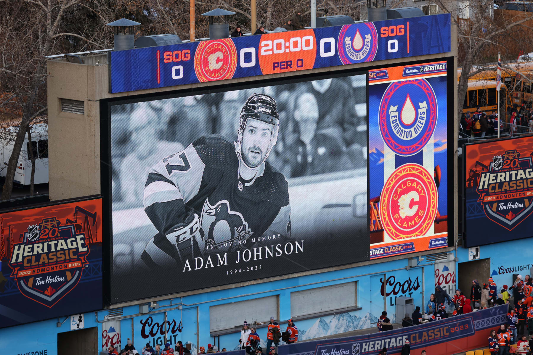 EDMONTON, ALBERTA - OCTOBER 29: A general view is seen of a video tribute to former NHL player Adam Johnson during pre-game ceremonies before the 2023 Tim Hortons NHL Heritage Classic between the Calgary Flames and the Edmonton Oilers at Commonwealth Stadium on October 29, 2023 in Edmonton, Alberta. (Photo by Jonathan Kozub/NHLI via Getty Images)