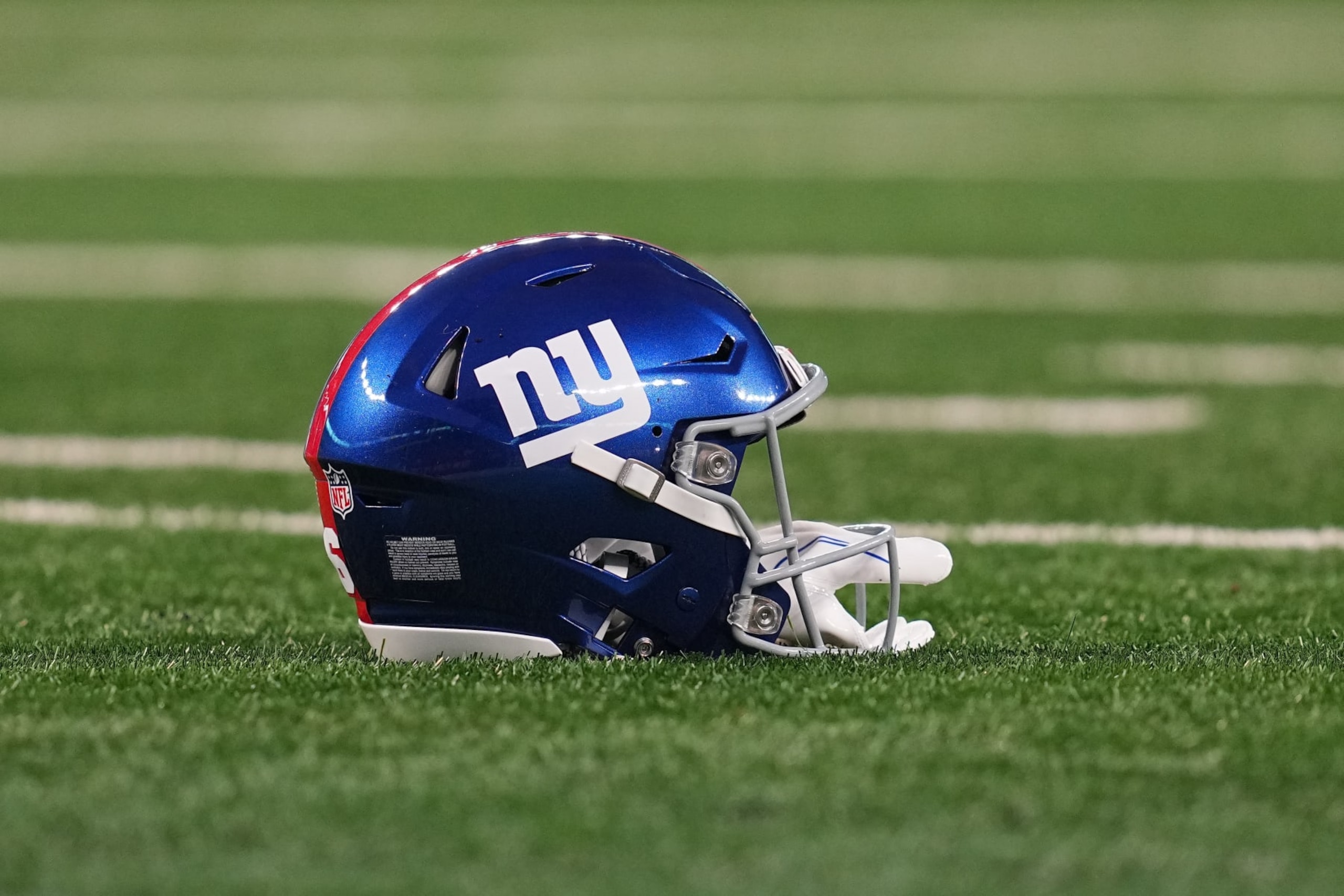 EAST RUTHERFORD, NEW JERSEY - SEPTEMBER 10: A generic view of a New York Giants helmet against the Dallas Cowboys at MetLife Stadium on September 10, 2023 in East Rutherford, New Jersey. (Photo by Mitchell Leff/Getty Images) EAST RUTHERFORD, NEW JERSEY - SEPTEMBER 10: A generic view of a New York Giants helmet against the Dallas Cowboys at MetLife Stadium on September 10, 2023 in East Rutherford, New Jersey. (Photo by Mitchell Leff/Getty Images)
