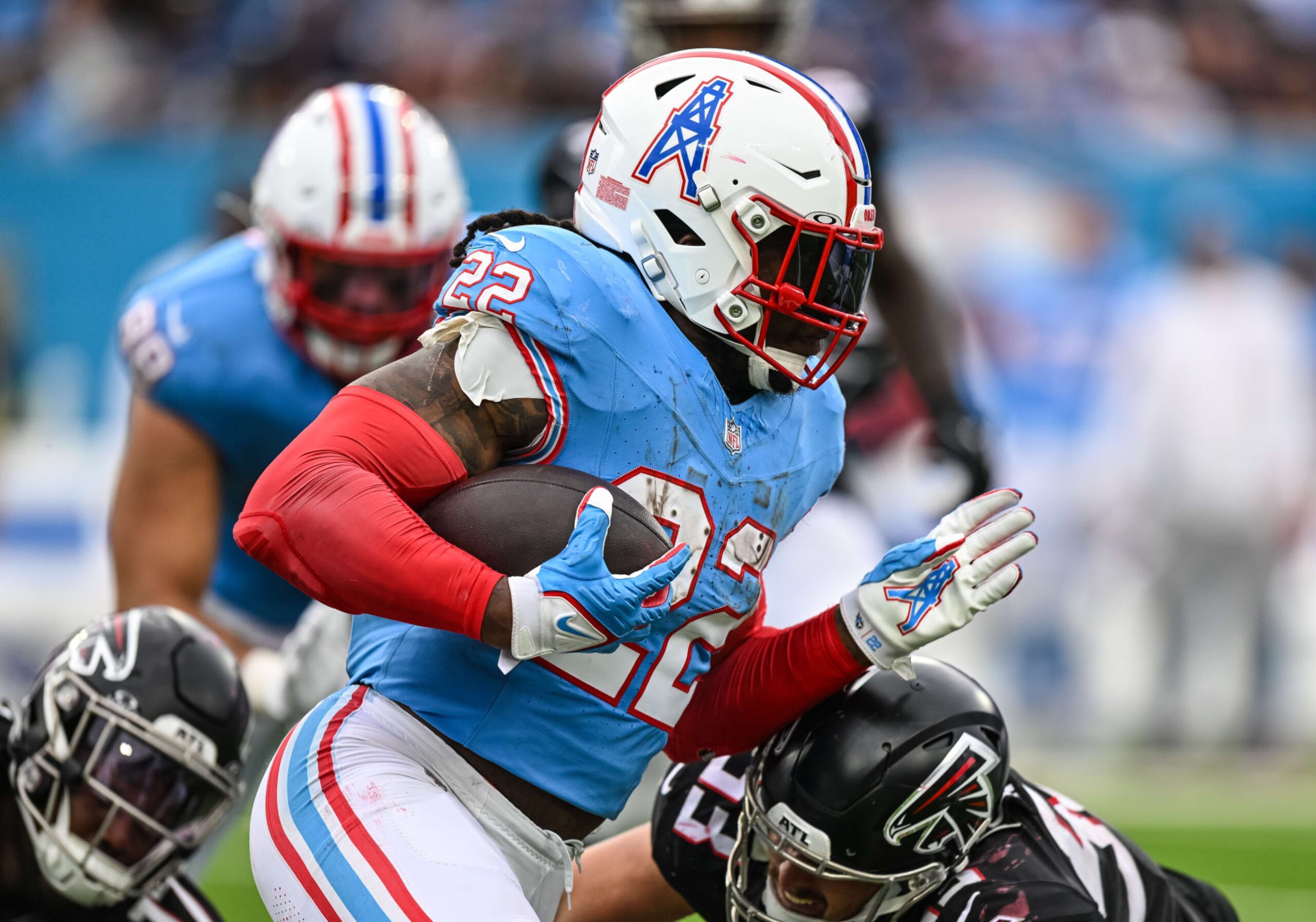 NASHVILLE, TN - OCTOBER 29: Tennessee Titans running back Derrick Henry (22) runs with the ball during a game between the Tennessee Titans and the Atlanta Falcons on October 29, 2023, at Nissan Stadium in Nashville, TN.  (Photo by Bryan Lynn/Icon Sportswire via Getty Images)