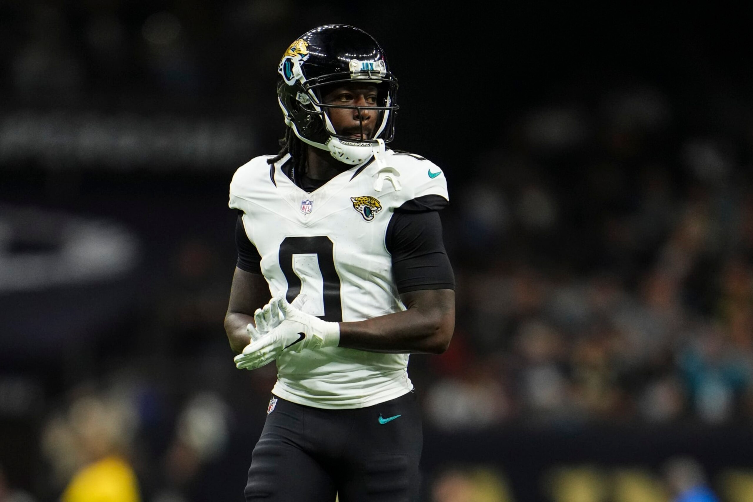 NEW ORLEANS, LA - OCTOBER 19: Calvin Ridley #0 of the Jacksonville Jaguars looks on from the field during an NFL football game against the New Orleans Saints at Caesars Superdome on October 19, 2023 in New Orleans, Louisiana. (Photo by Cooper Neill/Getty Images) NEW ORLEANS, LA - OCTOBER 19: Calvin Ridley #0 of the Jacksonville Jaguars looks on from the field during an NFL football game against the New Orleans Saints at Caesars Superdome on October 19, 2023 in New Orleans, Louisiana. (Photo by Cooper Neill/Getty Images)