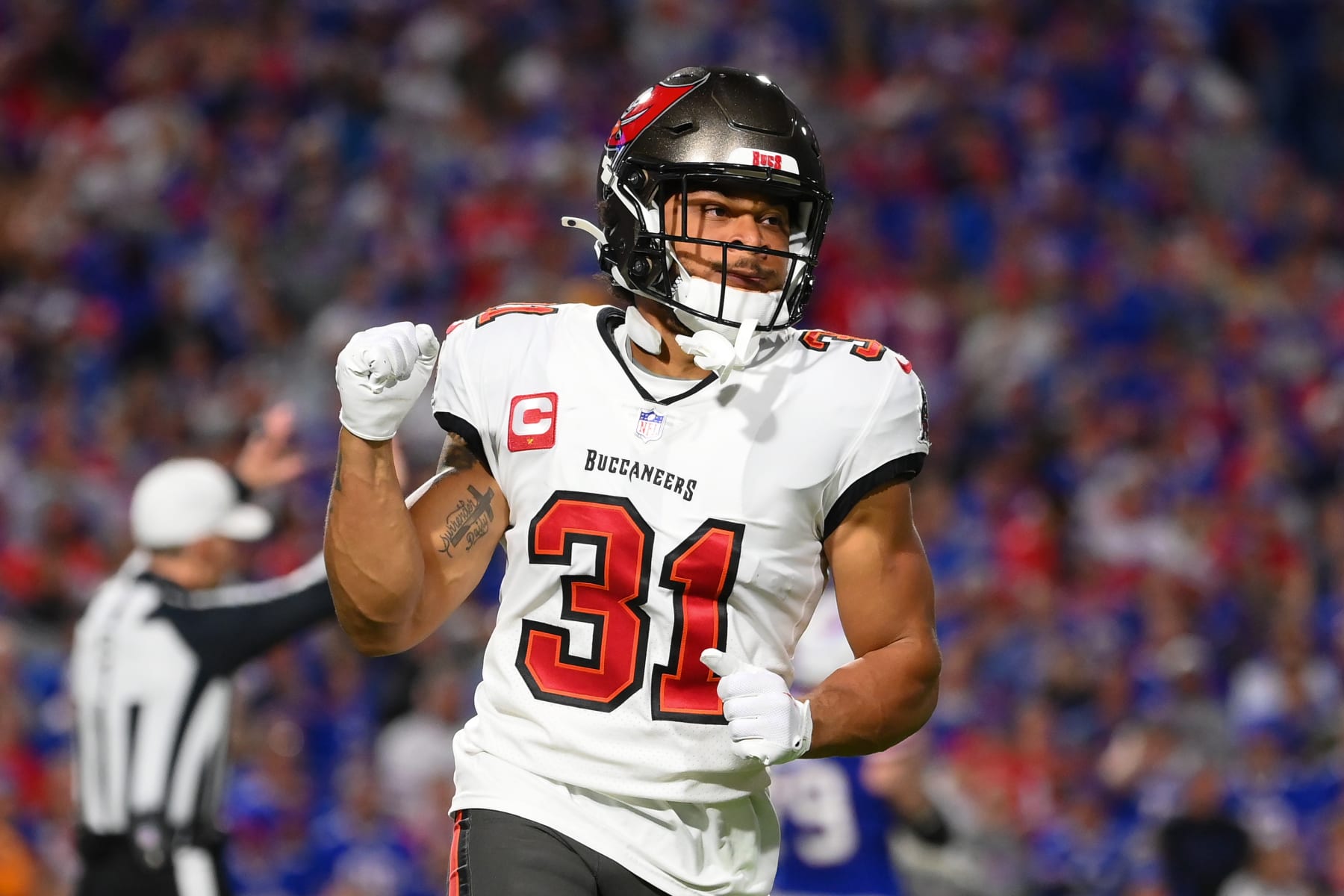 ORCHARD PARK, NEW YORK - OCTOBER 26: Antoine Winfield Jr. #31 of the Tampa Bay Buccaneers reacts to a defensive play against the Buffalo Bills during the first half at Highmark Stadium on October 26, 2023 in Orchard Park, New York. (Photo by Rich Barnes/Getty Images)