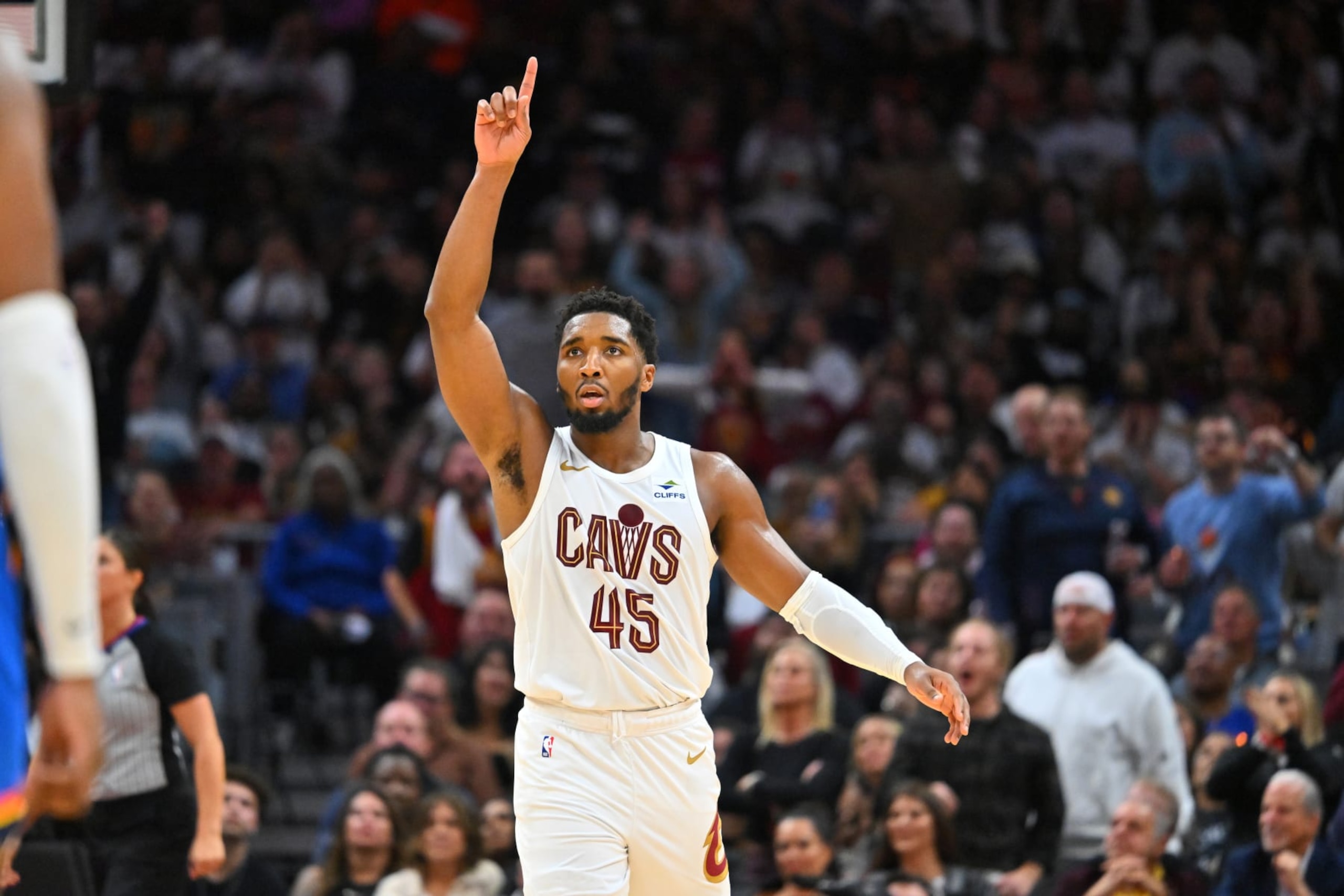 CLEVELAND, OHIO - OCTOBER 27: Donovan Mitchell #45 of the Cleveland Cavaliers signals to his teammates during the fourth quarter against the Oklahoma City Thunder at Rocket Mortgage Fieldhouse on October 27, 2023 in Cleveland, Ohio. The Thunder defeated the Cavaliers 108-105. NOTE TO USER: User expressly acknowledges and agrees that, by downloading and or using this photograph, User is consenting to the terms and conditions of the Getty Images License Agreement. (Photo by Jason Miller/Getty Images)