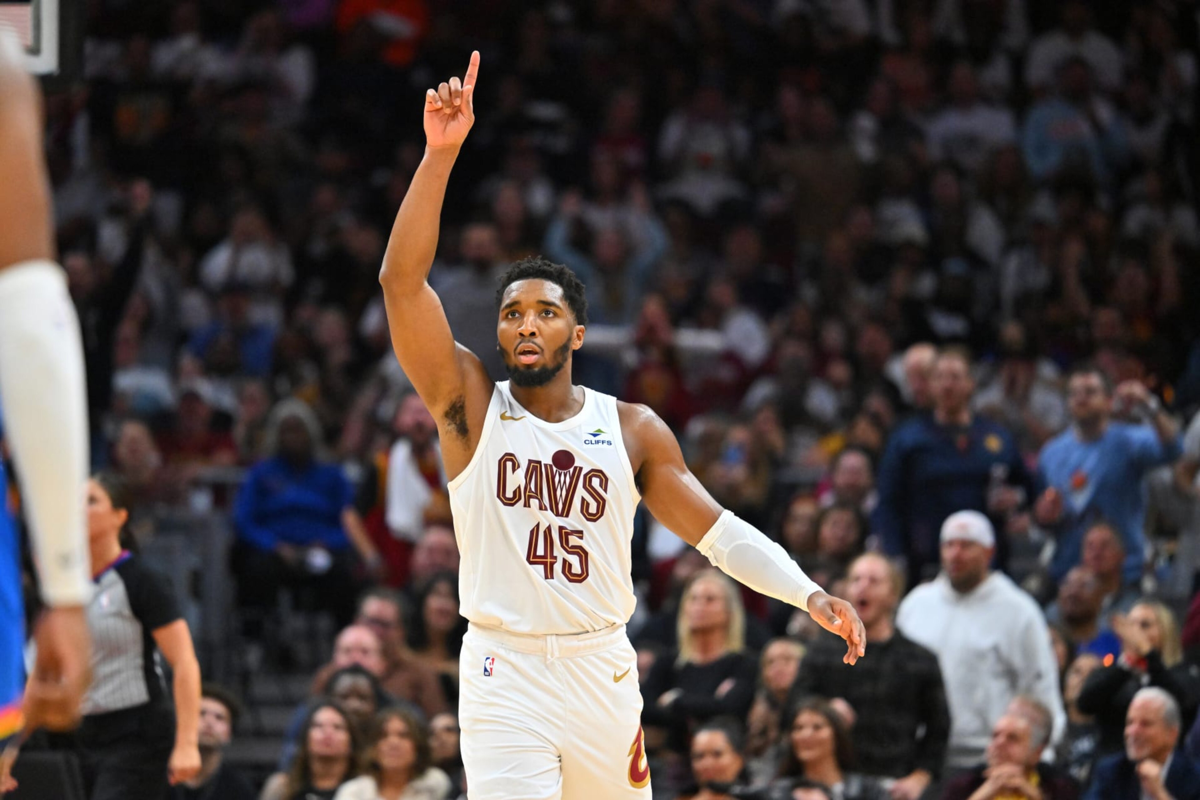 CLEVELAND, OHIO - OCTOBER 27: Donovan Mitchell #45 of the Cleveland Cavaliers signals to his teammates during the fourth quarter against the Oklahoma City Thunder at Rocket Mortgage Fieldhouse on October 27, 2023 in Cleveland, Ohio. The Thunder defeated the Cavaliers 108-105. NOTE TO USER: User expressly acknowledges and agrees that, by downloading and or using this photograph, User is consenting to the terms and conditions of the Getty Images License Agreement. (Photo by Jason Miller/Getty Images)