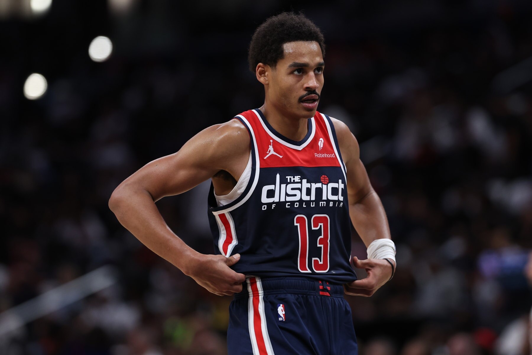 WASHINGTON, DC - OCTOBER 28: Jordan Poole #13 of the Washington Wizards reacts against the Memphis Grizzlies at Capital One Arena on October 28, 2023 in Washington, DC. NOTE TO USER: User expressly acknowledges and agrees that, by downloading and or using this photograph, User is consenting to the terms and conditions of the Getty Images License Agreement. (Photo by Patrick Smith/Getty Images)