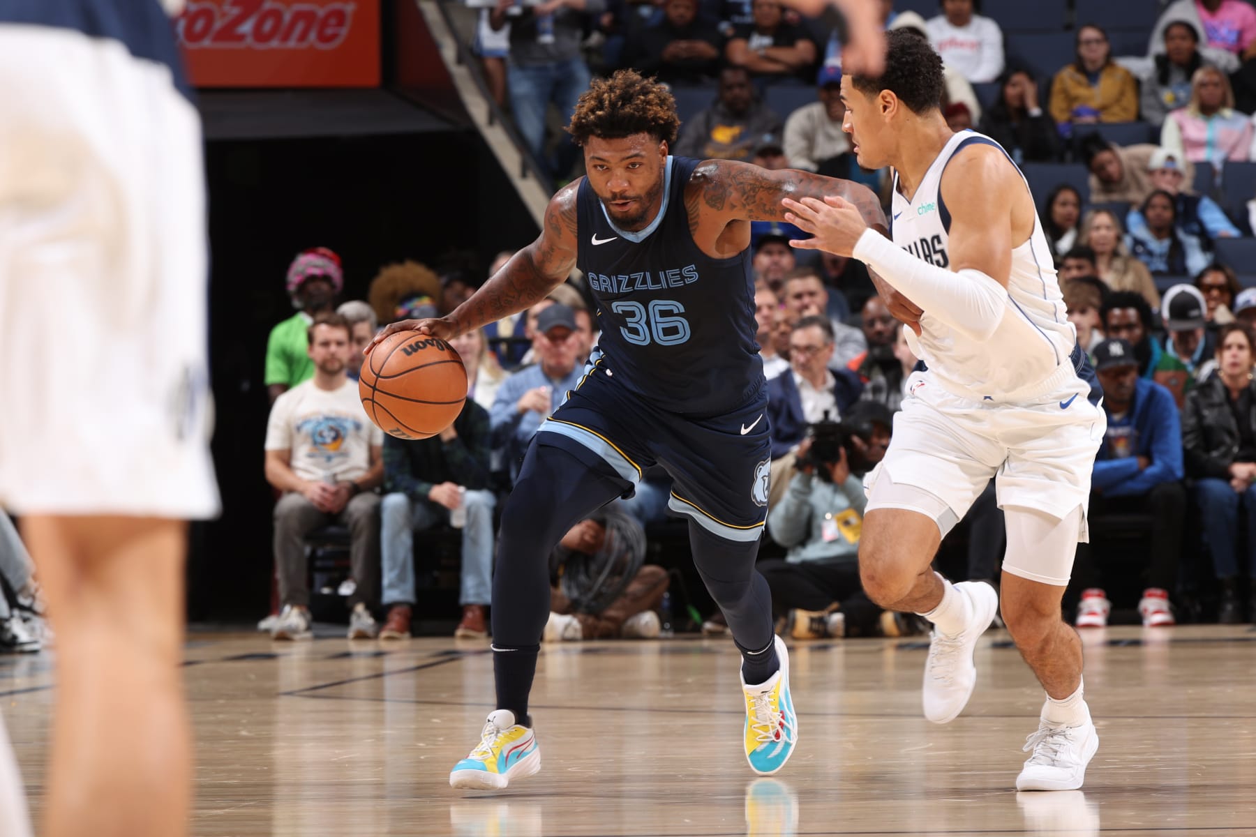 MEMPHIS, TN - OCTOBER 30: Marcus Smart #36 of the Memphis Grizzlies dribbles the ball during the game against the Dallas Mavericks on October 30, 2023 at FedExForum in Memphis, Tennessee. NOTE TO USER: User expressly acknowledges and agrees that, by downloading and or using this photograph, User is consenting to the terms and conditions of the Getty Images License Agreement. Mandatory Copyright Notice: Copyright 2023 NBAE (Photo by Joe Murphy/NBAE via Getty Images)