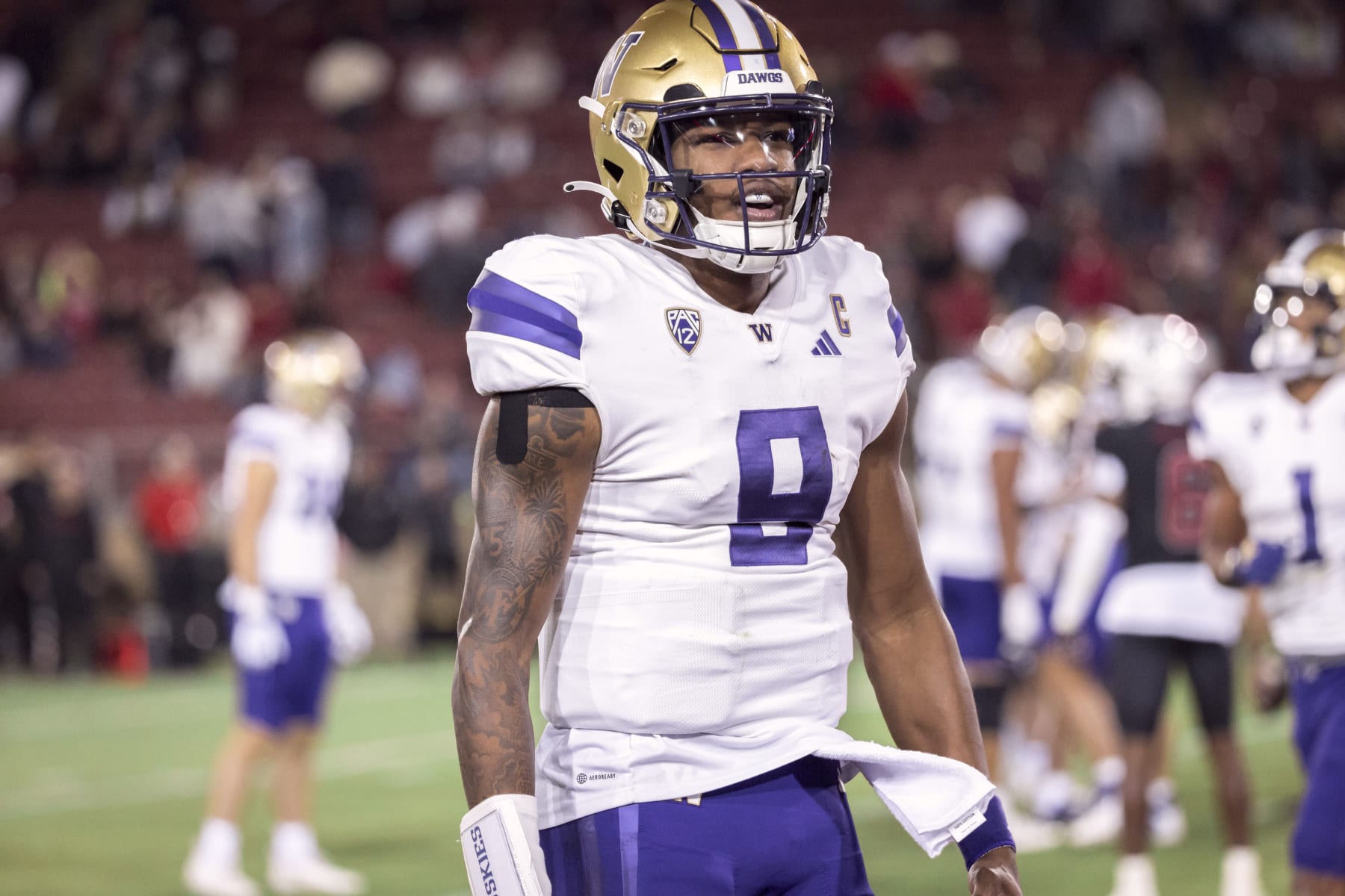 PALO ALTO, CA - OCTOBER  28:  Quarterback Michael Penix Jr. #9 of the Washington Huskies celebrates after throwing a touchdown pass during a Pac-12 NCAA college football game against the Stanford Cardinal on October 28, 2023 at Stanford Stadium in Palo Alto, California.  (Photo by David Madison/Getty Images)