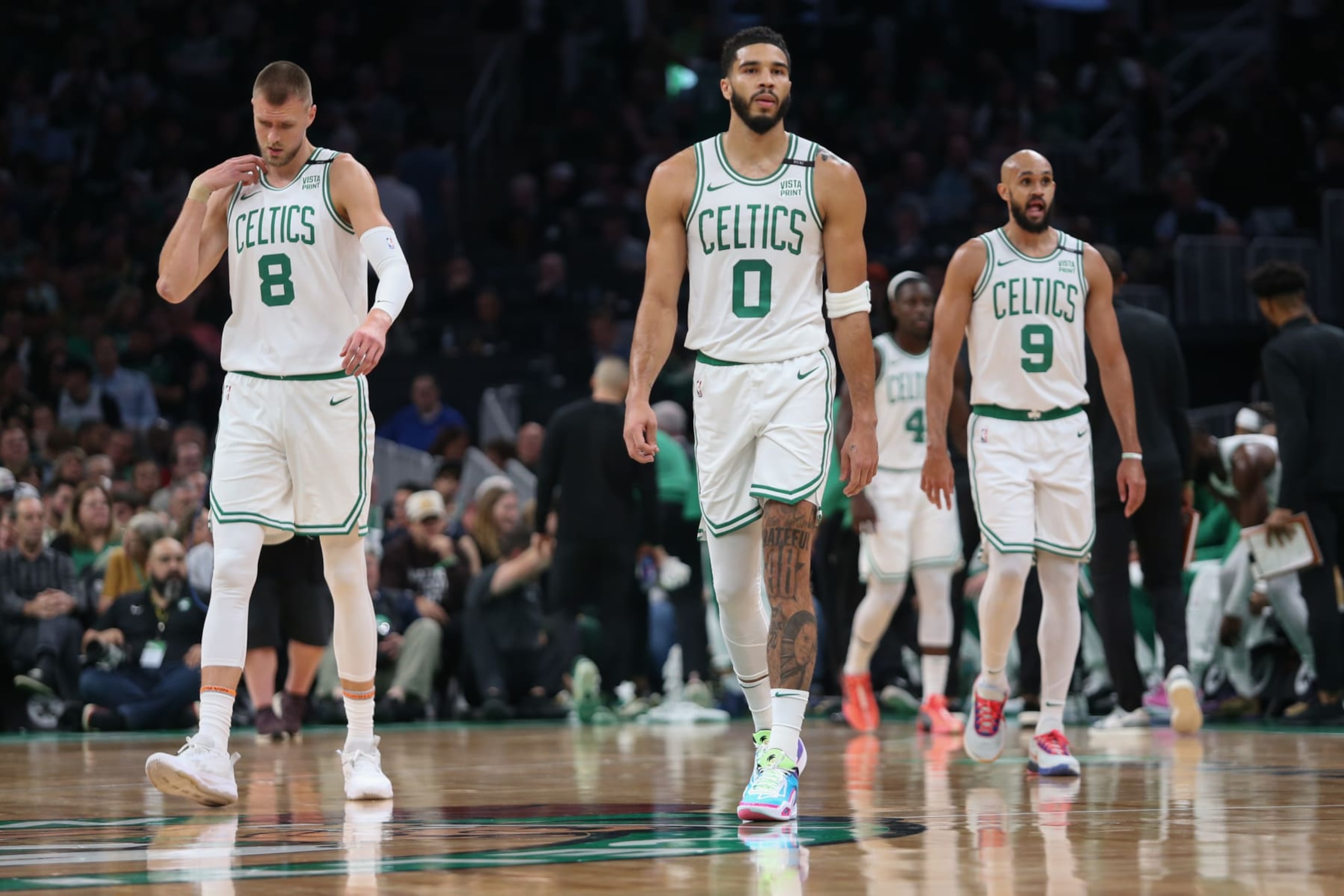 Kristaps PorziÅÄ£is, Jayson Tatum, Jrue Holiday and Derrick White
