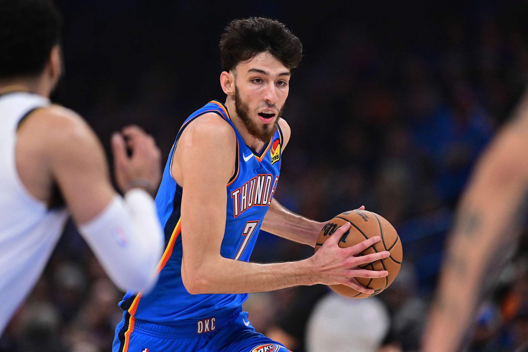 OKLAHOMA CITY, OKLAHOMA - OCTOBER 29: Chet Holmgren #7 of the Oklahoma City Thunder drives the ball during the first quarter against Denver Nuggets at Paycom Center on October 29, 2023 in Oklahoma City, Oklahoma. NOTE TO USER: User expressly acknowledges and agrees that, by downloading and or using this photograph, User is consenting to the terms and conditions of the Getty Images License Agreement. (Photo by Joshua Gateley/Getty Images)