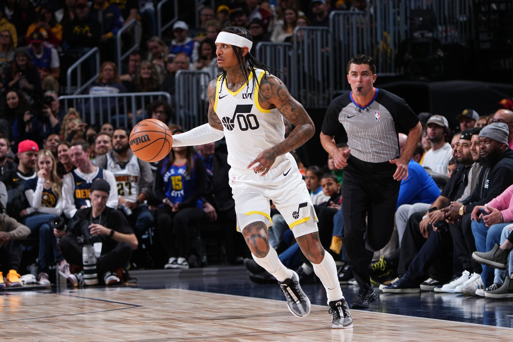 DENVER, CO - OCTOBER 30: Jordan Clarkson #00 of the Utah Jazz brings the ball up court against the Denver Nuggets on October 30, 2023 at the Ball Arena in Denver, Colorado. NOTE TO USER: User expressly acknowledges and agrees that, by downloading and/or using this Photograph, user is consenting to the terms and conditions of the Getty Images License Agreement. Mandatory Copyright Notice: Copyright 2023 NBAE (Photo by Garrett Ellwood/NBAE via Getty Images)