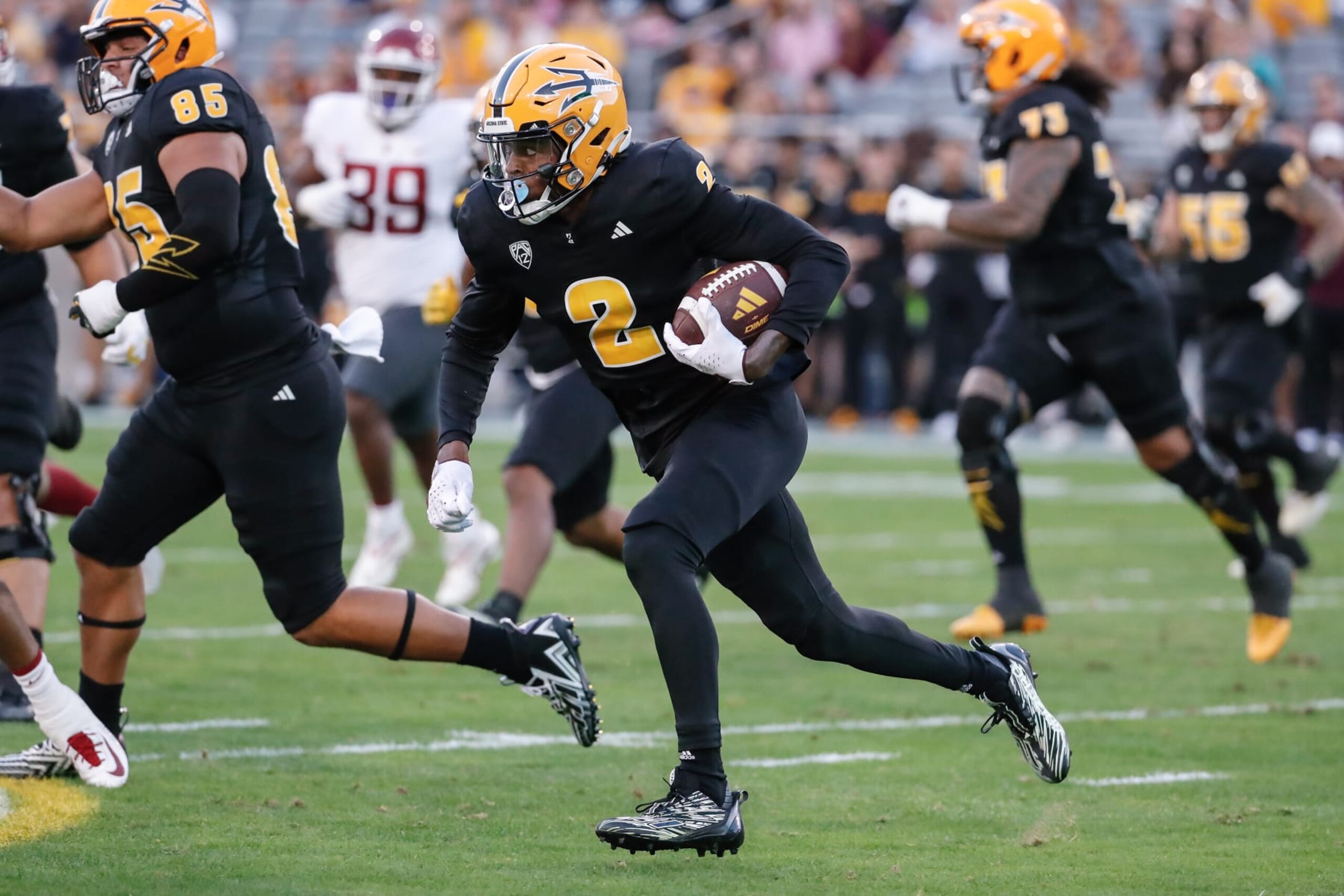 TEMPE, AZ - OCTOBER 28:  Arizona State Sun Devils wide receiver Elijhah Badger (2) runs the ball during the college football game between the Washington State Cougars and the Arizona State Sun Devils on October 28, 2023 at Mountain America Stadium in Tempe, Arizona. (Photo by Kevin Abele/Icon Sportswire via Getty Images)