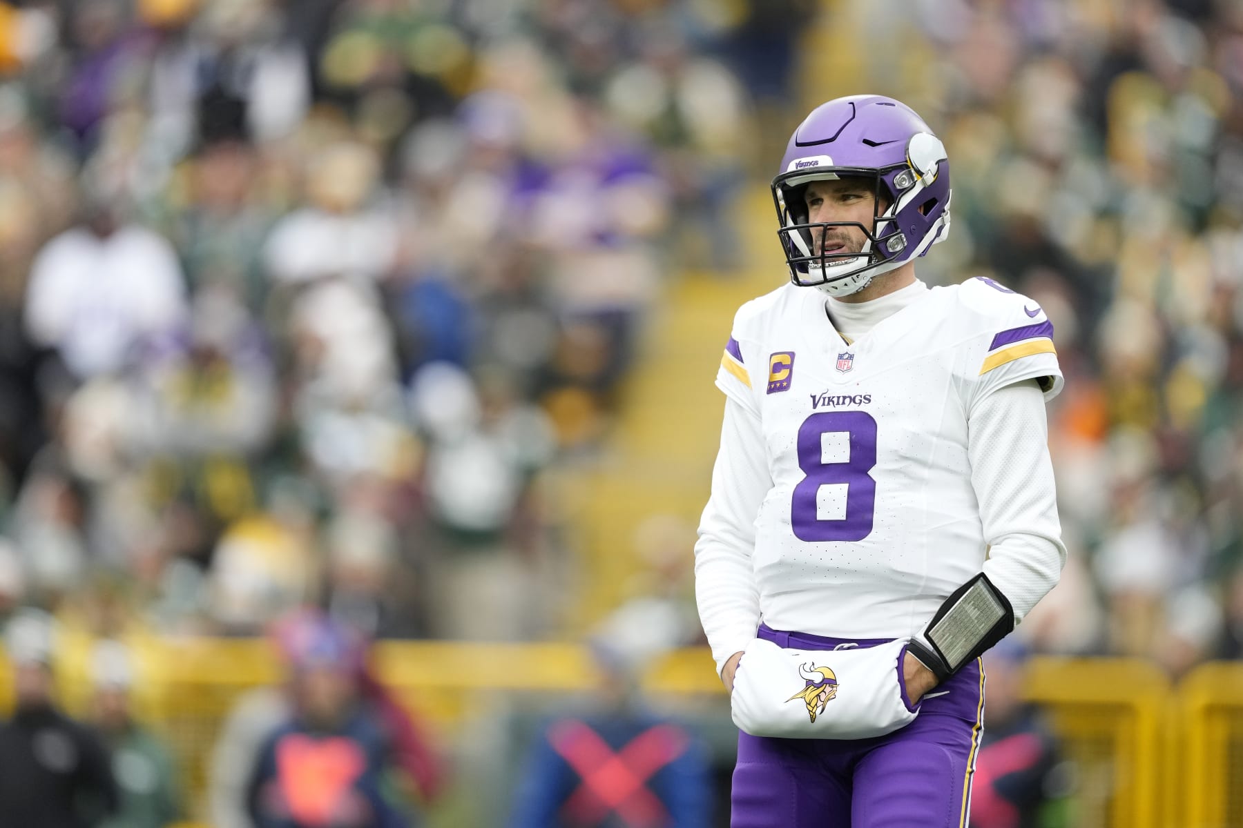 GREEN BAY, WISCONSIN - OCTOBER 29: Kirk Cousins #8 of the Minnesota Vikings looks on in the first half against the Green Bay Packers at Lambeau Field on October 29, 2023 in Green Bay, Wisconsin. (Photo by Patrick McDermott/Getty Images)