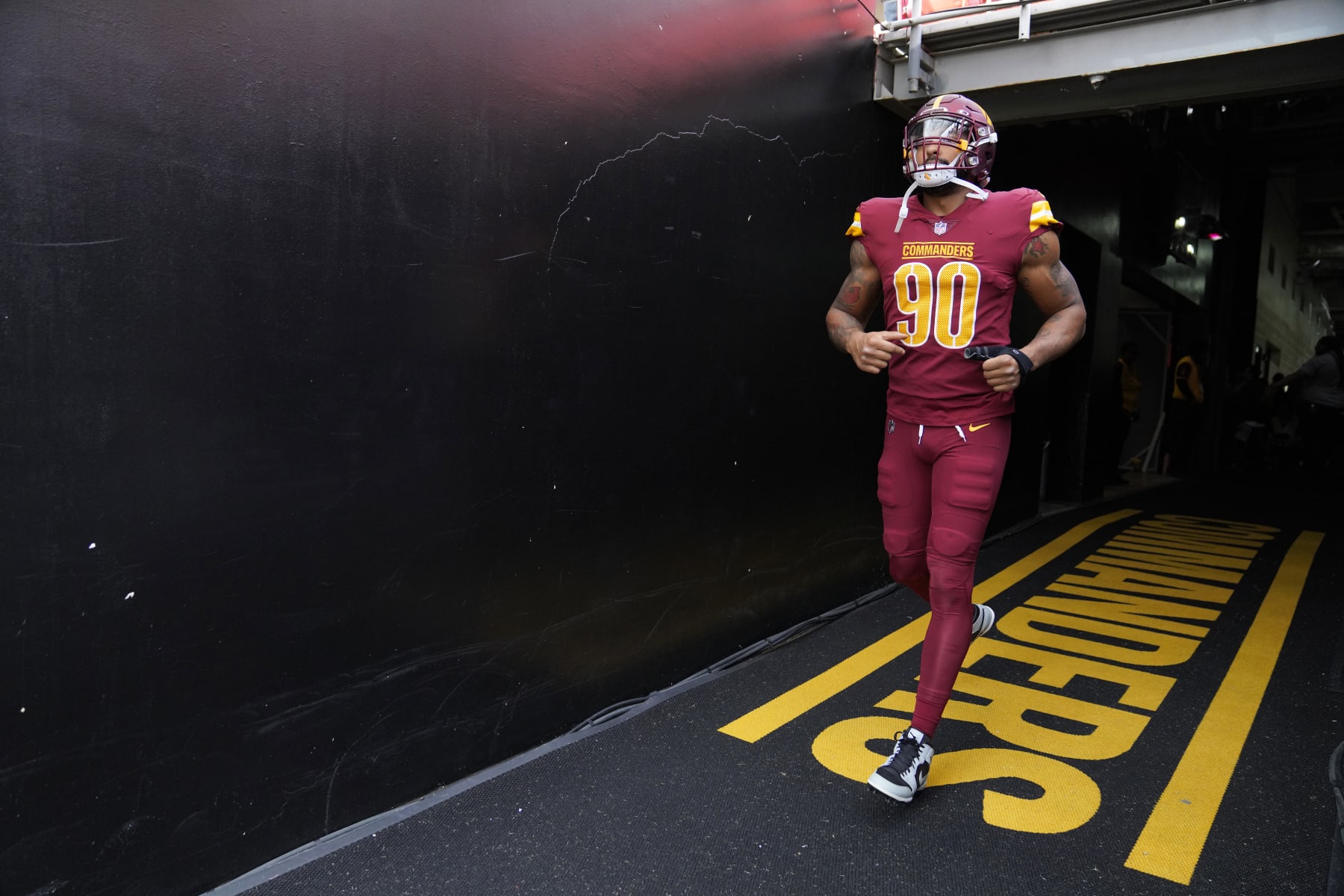 LANDOVER, MARYLAND - OCTOBER 29: Montez Sweat #90 of the Washington Commanders takes to the field prior to a game against the Philadelphia Eagles at FedExField on October 29, 2023 in Landover, Maryland. (Photo by Jess Rapfogel/Getty Images)
