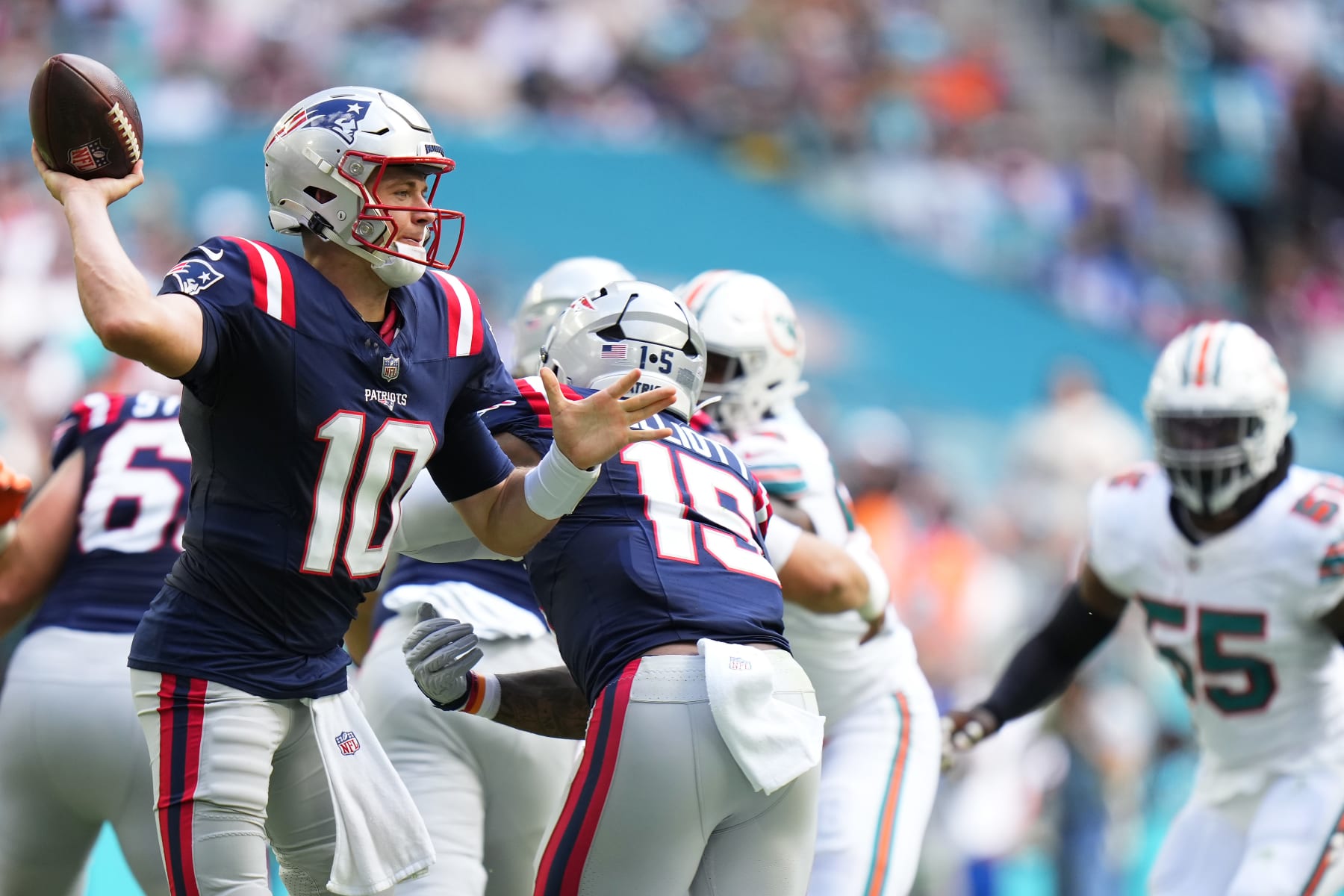 MIAMI GARDENS, FLORIDA - OCTOBER 29: Mac Jones #10 of the New England Patriots attempts a pass during the second quarter against the Miami Dolphins at Hard Rock Stadium on October 29, 2023 in Miami Gardens, Florida. (Photo by Rich Storry/Getty Images)