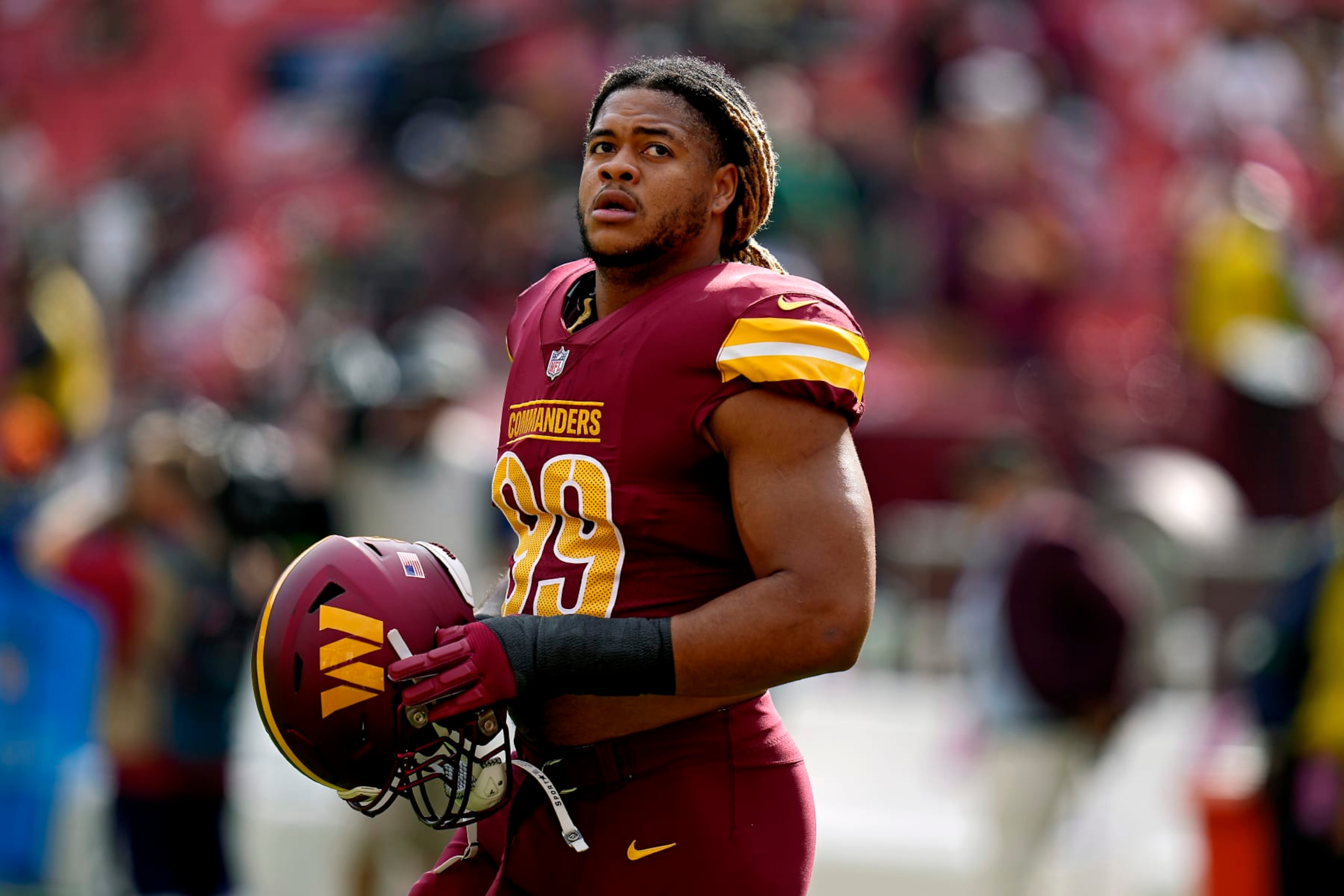 LANDOVER, MARYLAND - OCTOBER 29: Chase Young #99 of the Washington Commanders looks on prior to a game against the Philadelphia Eagles at FedExField on October 29, 2023 in Landover, Maryland. (Photo by Jess Rapfogel/Getty Images)