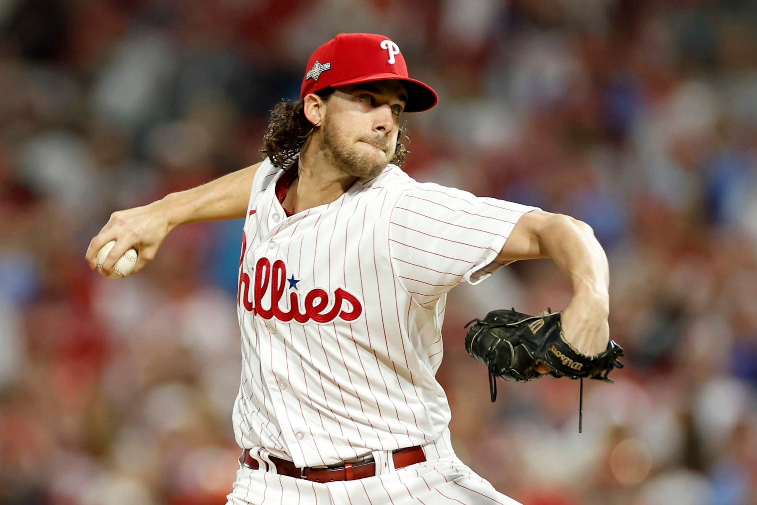PHILADELPHIA, PENNSYLVANIA - OCTOBER 17: Aaron Nola #27 of the Philadelphia Phillies throws a first inning pitch against the Arizona Diamondbacks during Game Two of the Championship Series at Citizens Bank Park on October 17, 2023 in Philadelphia, Pennsylvania. (Photo by Sarah Stier/Getty Images)