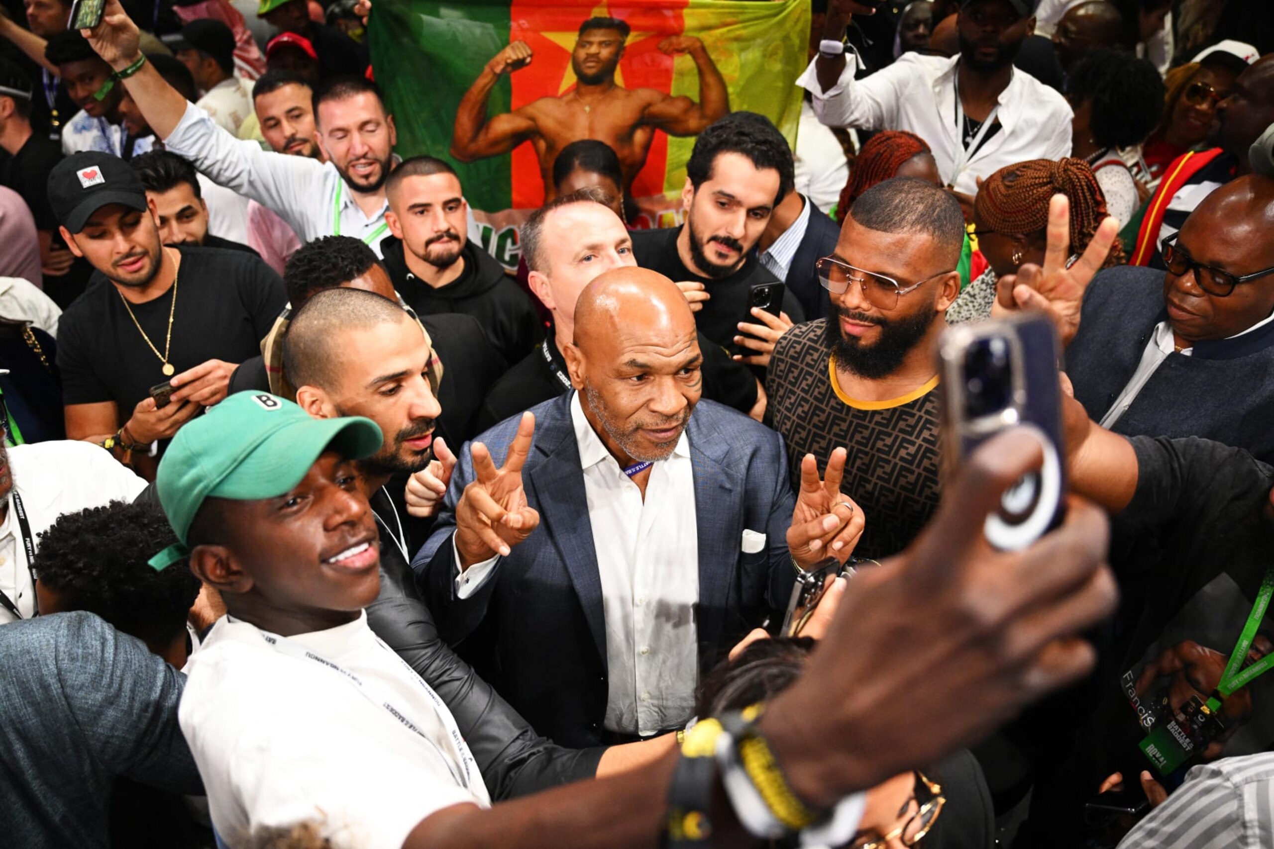 RIYADH, SAUDI ARABIA - OCTOBER 28: Mike Tyson poses for photos with fans after the Heavyweight fight between Tyson Fury and Francis Ngannou at Boulevard Hall on October 28, 2023 in Riyadh, Saudi Arabia. (Photo by Justin Setterfield/Getty Images)