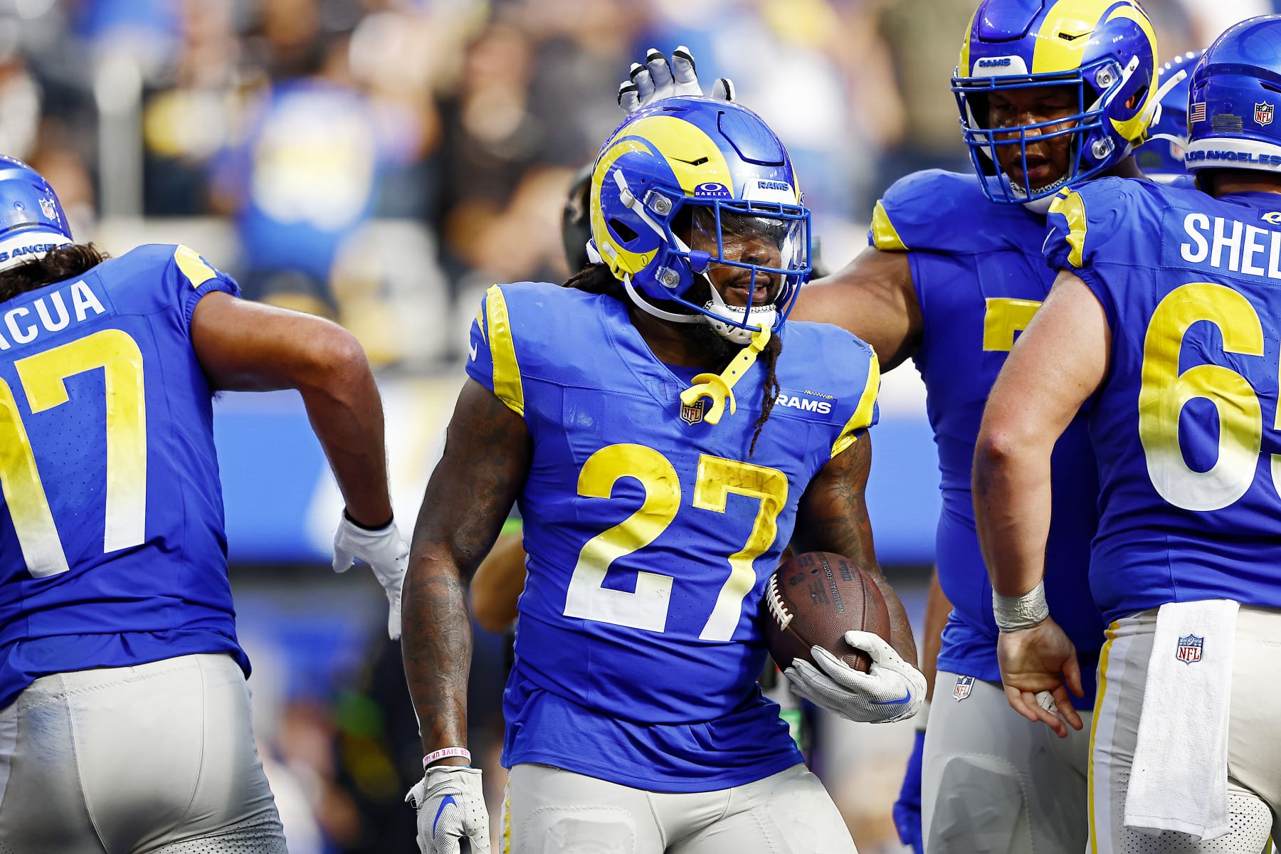 INGLEWOOD, CALIFORNIA - OCTOBER 22: Darrell Henderson Jr. #27 of the Los Angeles Rams reacts to a touchdown during the third quarter against the Pittsburgh Steelers at SoFi Stadium on October 22, 2023 in Inglewood, California. (Photo by Ronald Martinez/Getty Images)