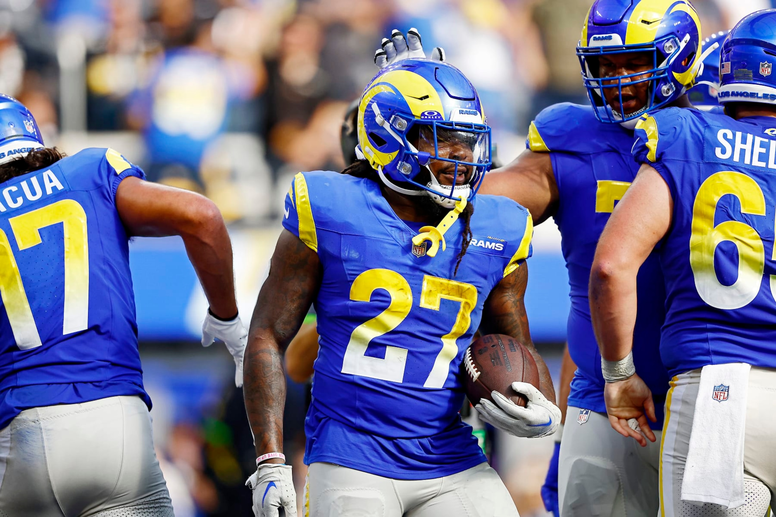 INGLEWOOD, CALIFORNIA - OCTOBER 22: Darrell Henderson Jr. #27 of the Los Angeles Rams reacts to a touchdown during the third quarter against the Pittsburgh Steelers at SoFi Stadium on October 22, 2023 in Inglewood, California. (Photo by Ronald Martinez/Getty Images)