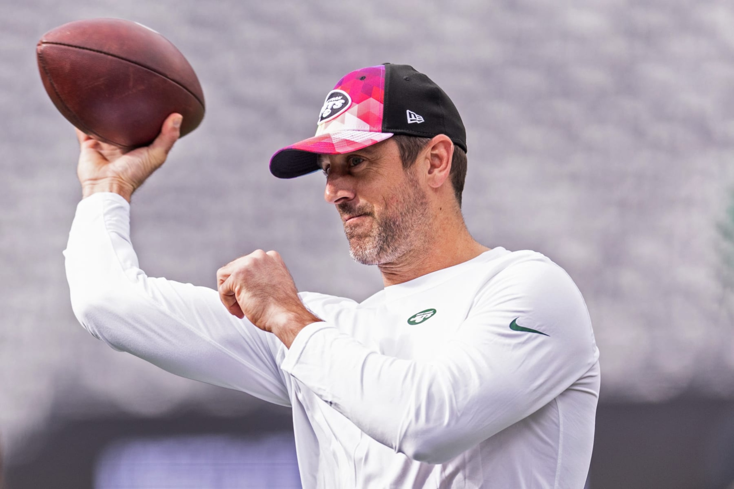 EAST RUTHERFORD, NEW JERSEY - OCTOBER 15: Aaron Rodgers #8 of the New York Jets throws the football prior to the game against the Philadelphia Eagles at MetLife Stadium on October 15, 2023 in East Rutherford, New Jersey. (Photo by Dustin Satloff/Getty Images)